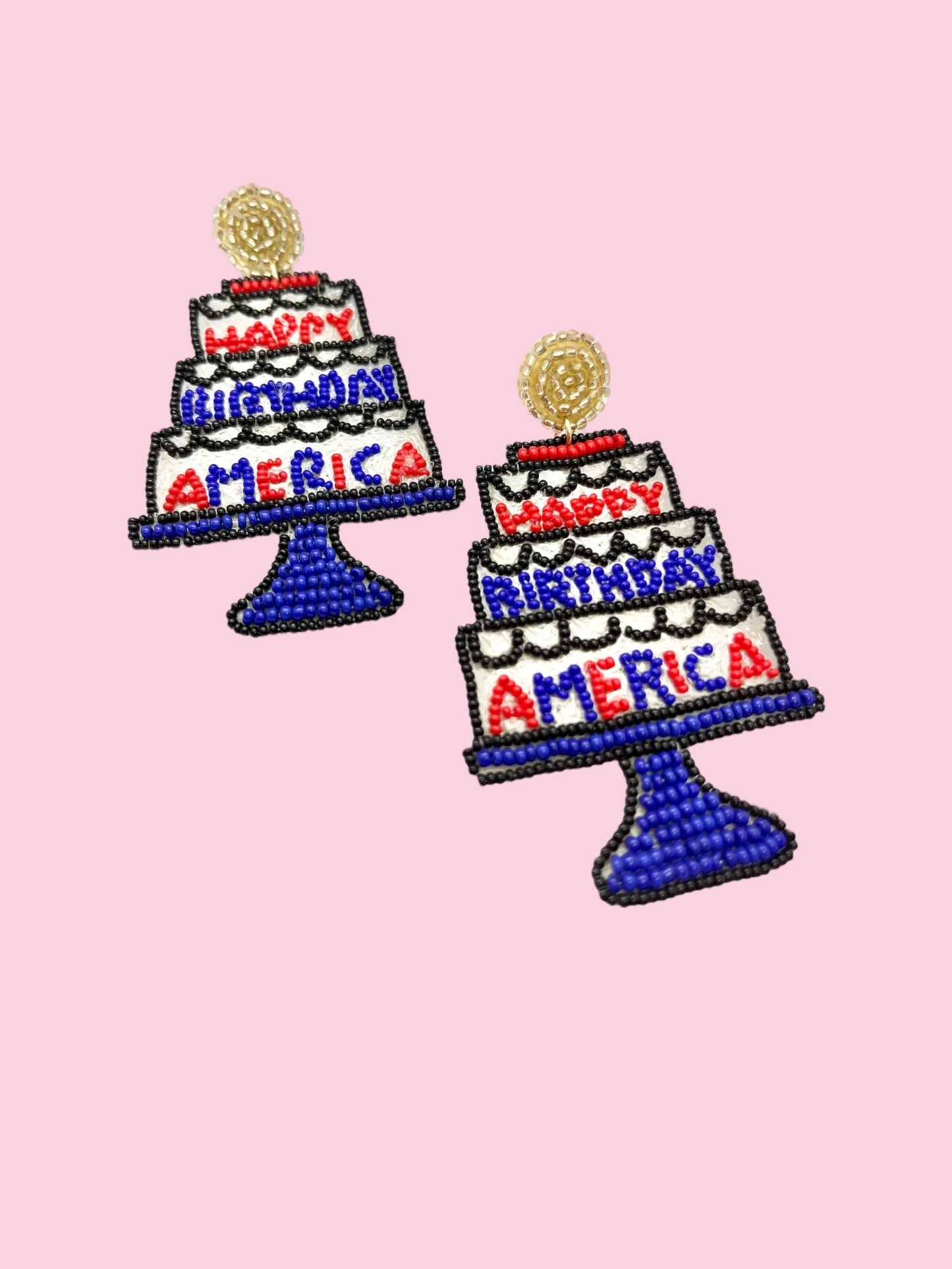 USA Cake beaded earrings by Camel Threads featuring colorful beaded design and silver hooks on a plain background.