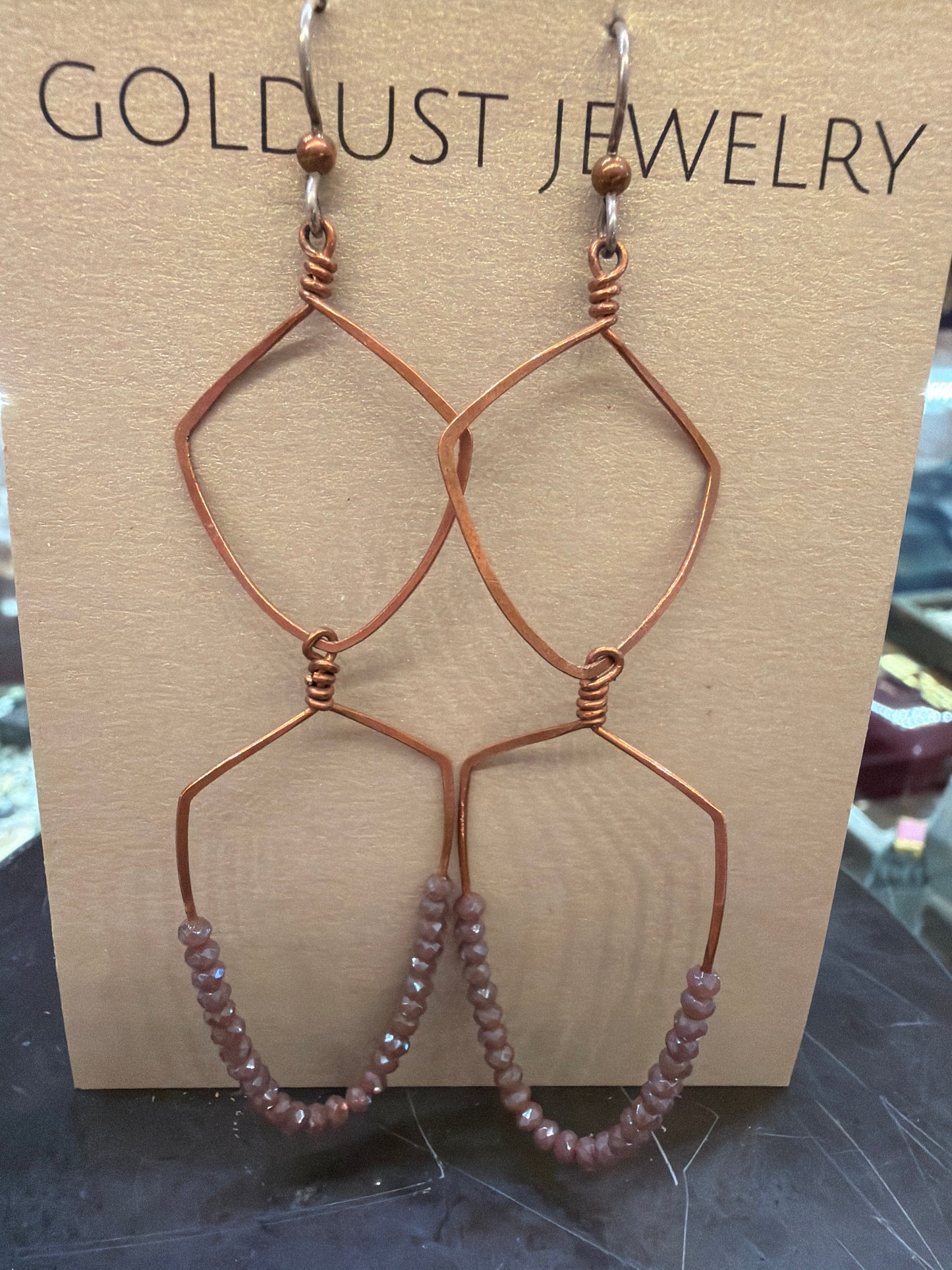 Goldust Jewelry GD Crystal Earrings featuring sparkling crystal stones and elegant design, perfect for stylish accessorizing.
