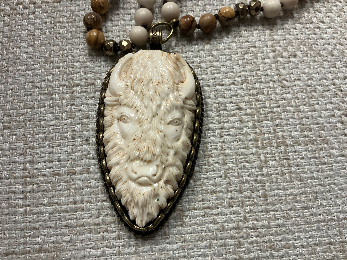 Beaded Buffalo Talisman Necklace with colorful beads and pendant, handcrafted jewelry by American Unique Group.