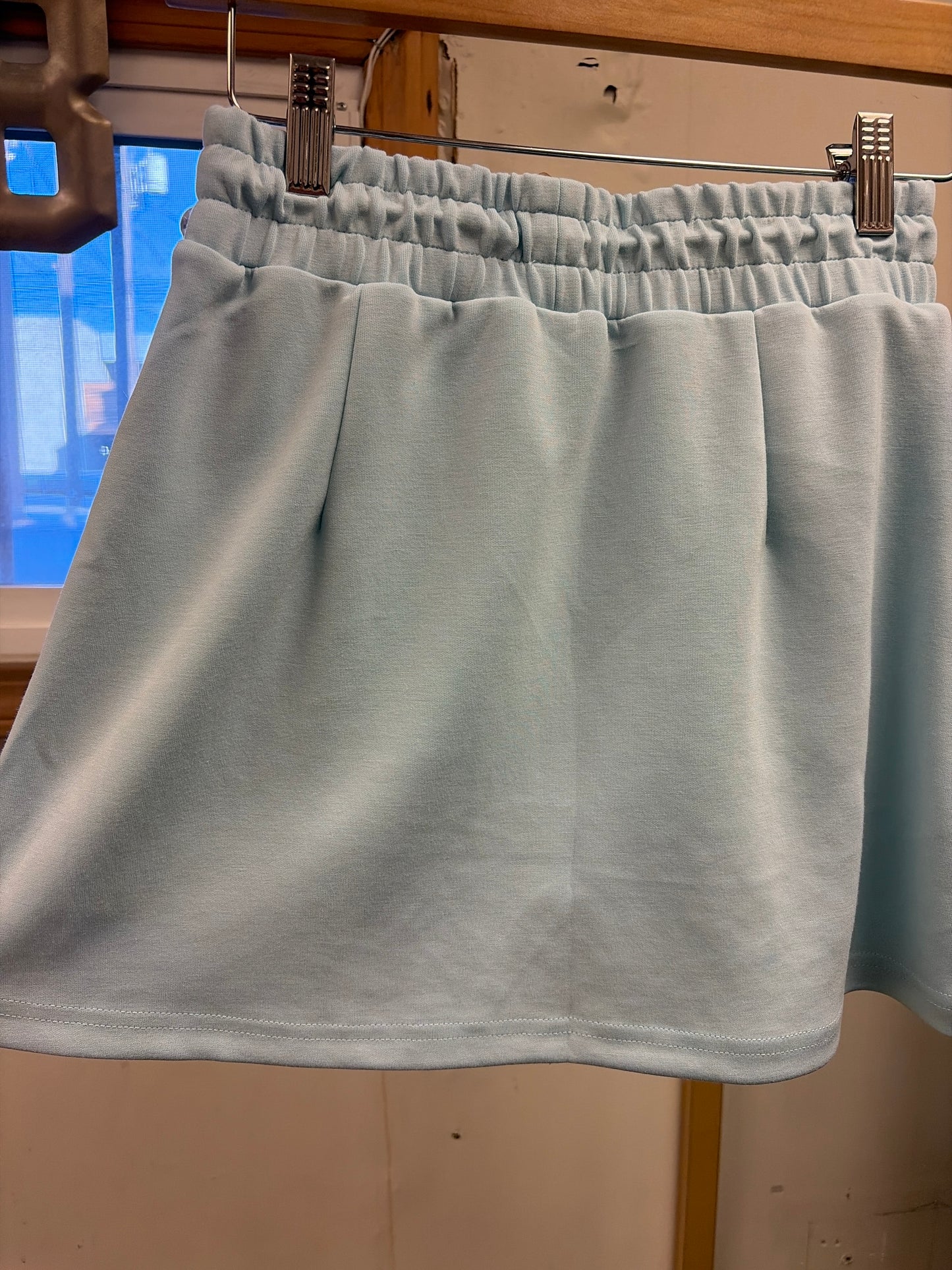 Blue breezy Simply Southern skort with side pockets and adjustable waistband, perfect for casual summer wear.