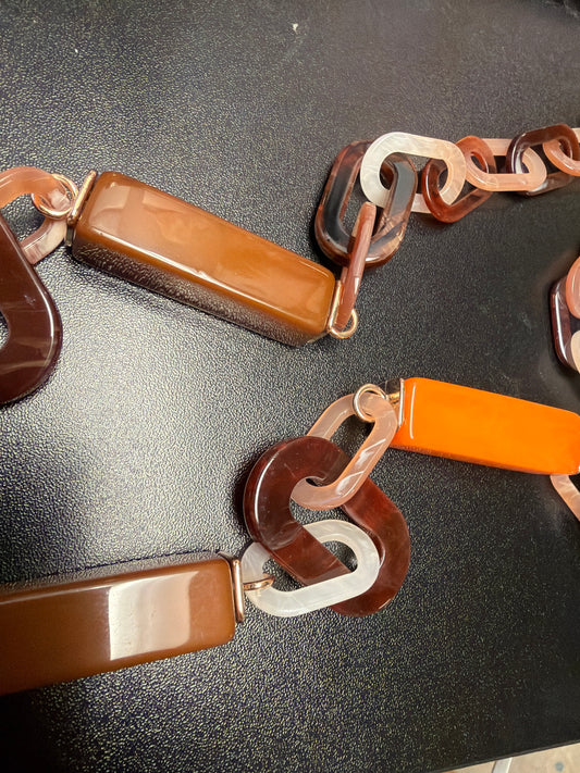 Queen Gypsy Lucite Links Necklace showing large translucent rectangular and oval lucite links on a chain.