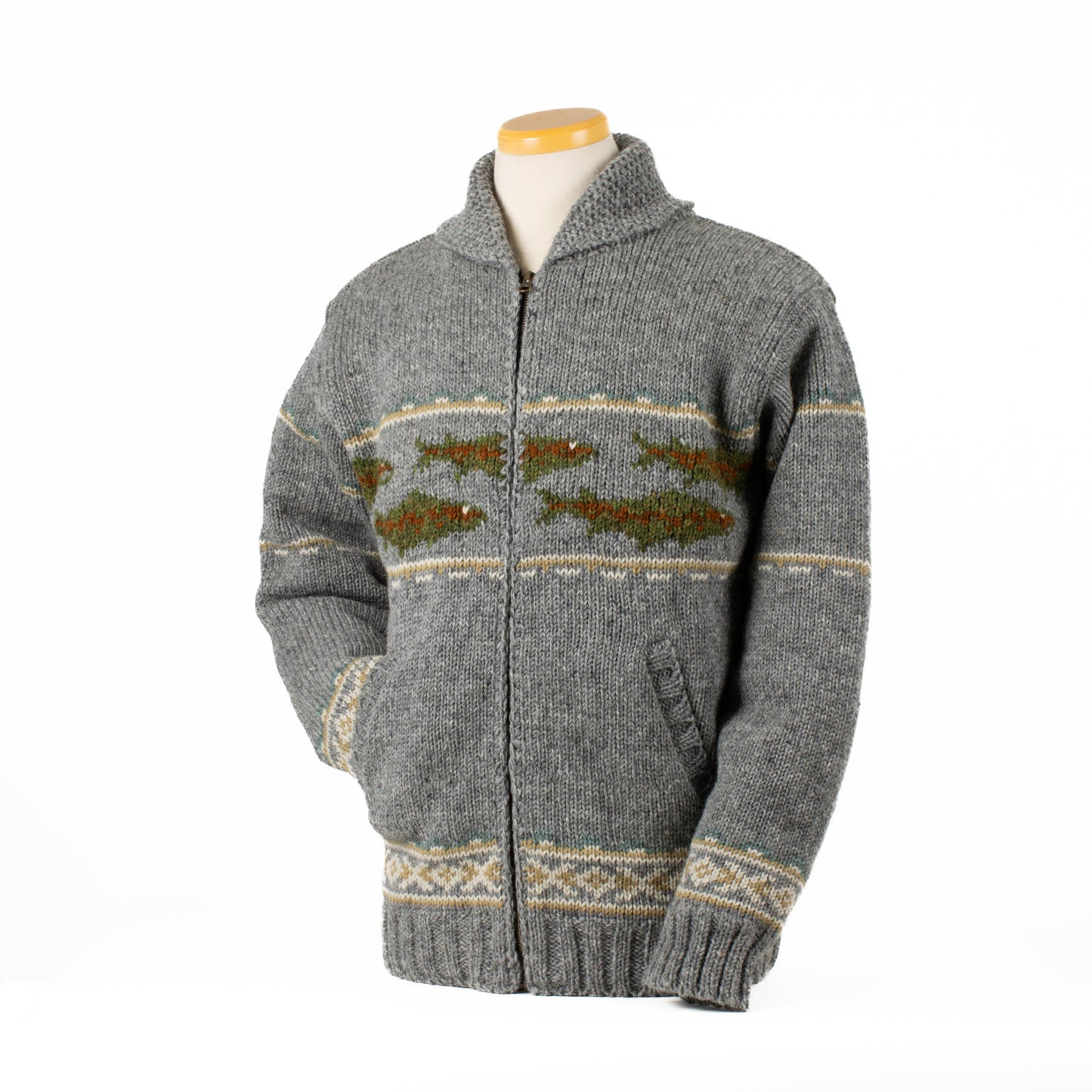 Lost Horizons Knitwear Gone Fishing sweater, cozy knit sweater with fishing motif, in a natural outdoor setting.
