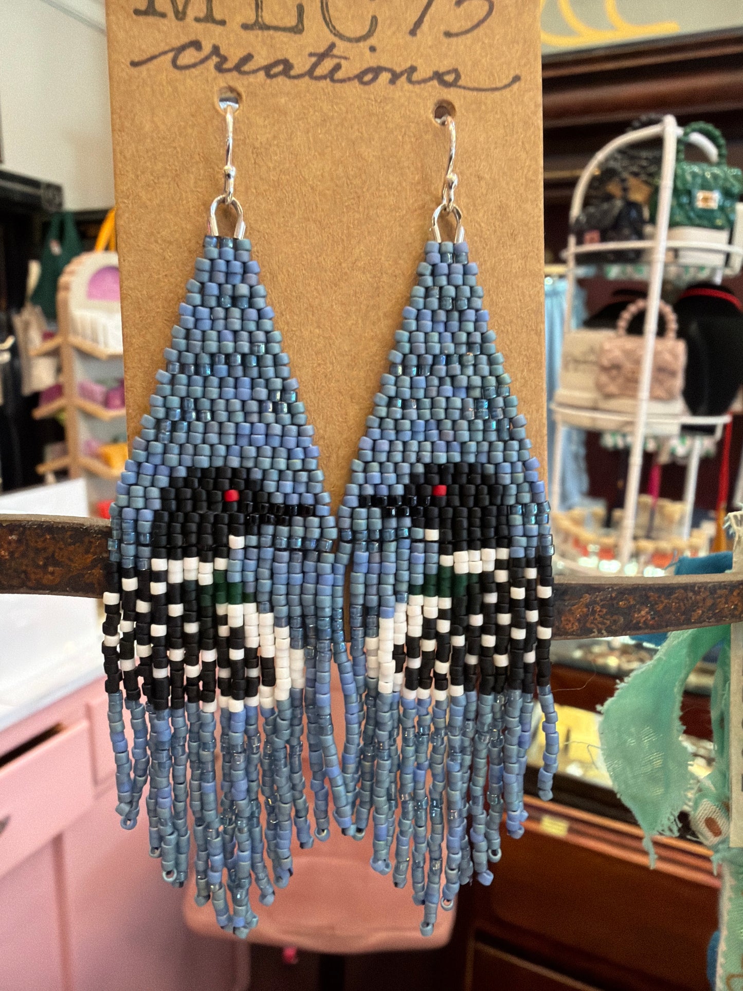 Hand beaded loon earrings by MLC73 featuring intricate beadwork and a loon bird design, perfect for nature-inspired jewelry.