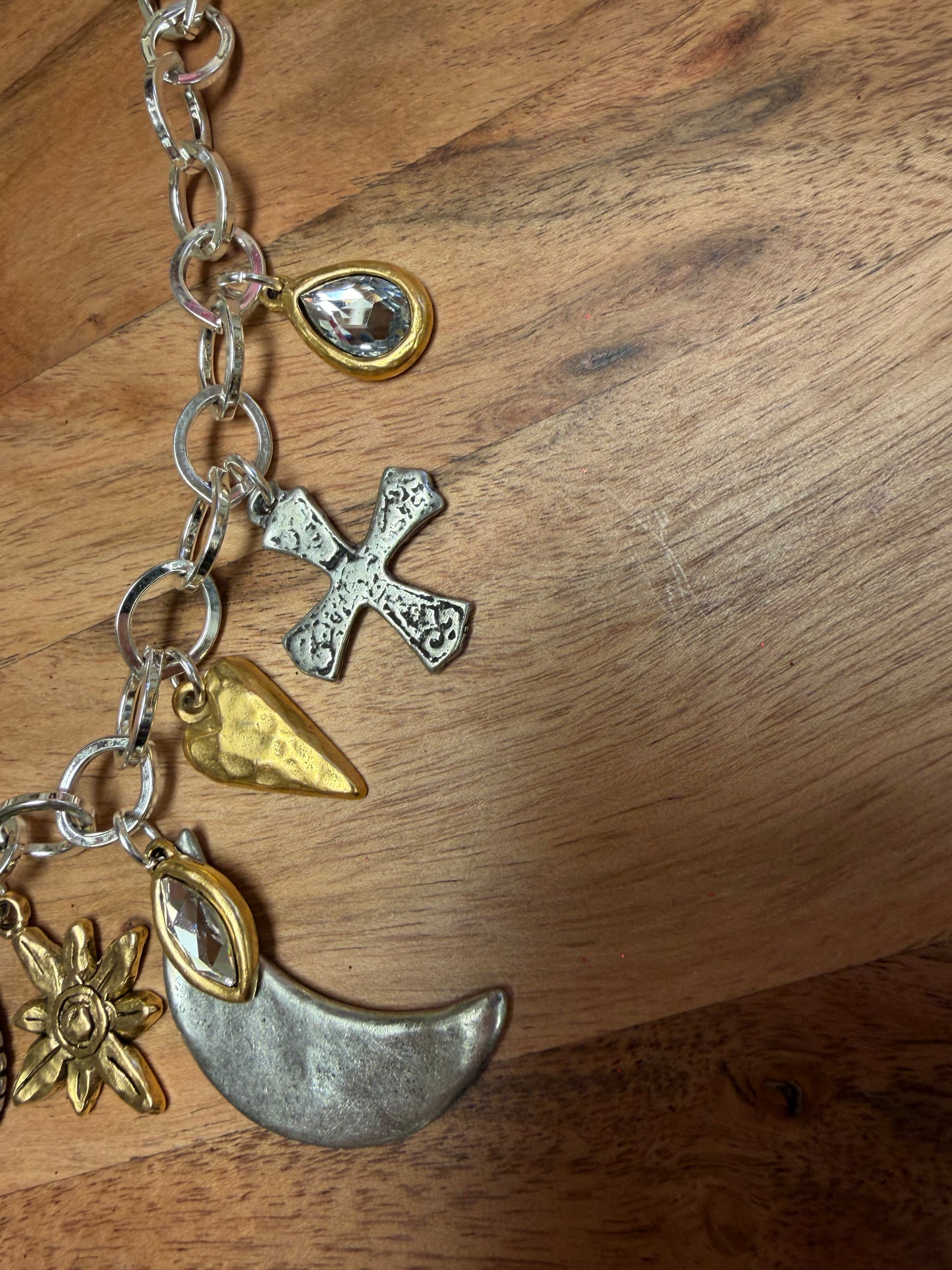 Lula 'n' Lee Charmed by the Moon necklace featuring a crescent moon pendant on a delicate chain.