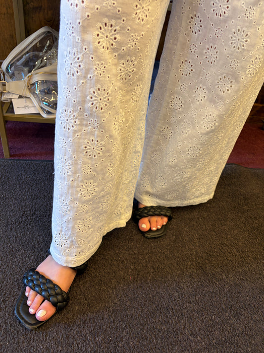 Simply Southern eyelet lace pants displayed on a model, showcasing lightweight, stylish bottoms with intricate lace details.