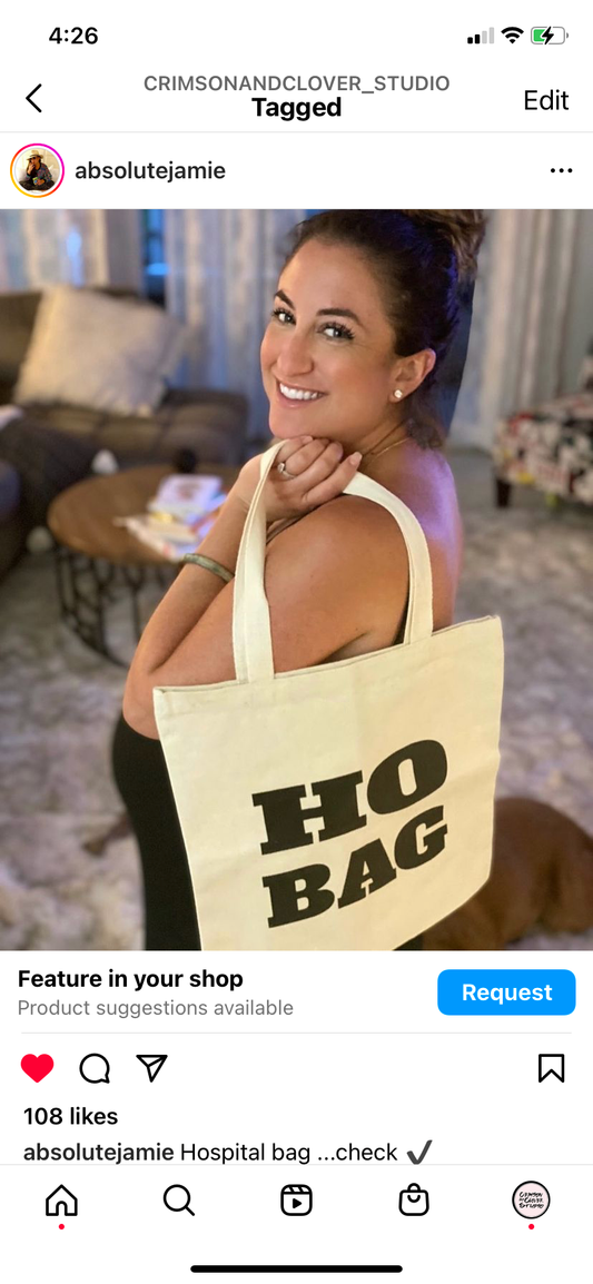 Crimson and Clover Studio Ho Bag funny tote with card design, featuring colorful and playful artwork on a fabric tote bag.