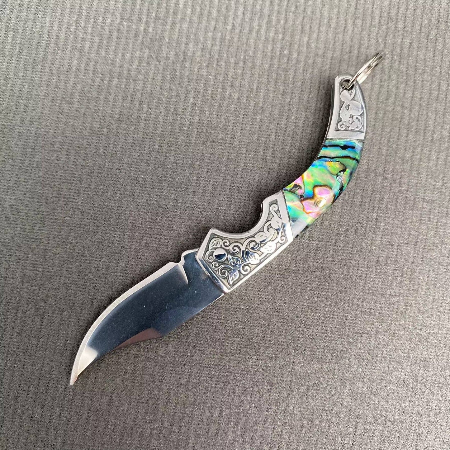 Mio Queena Shell Inlaid Tiny Knife with detailed shell inlay on small, decorative knife blade and handle for collectible use.