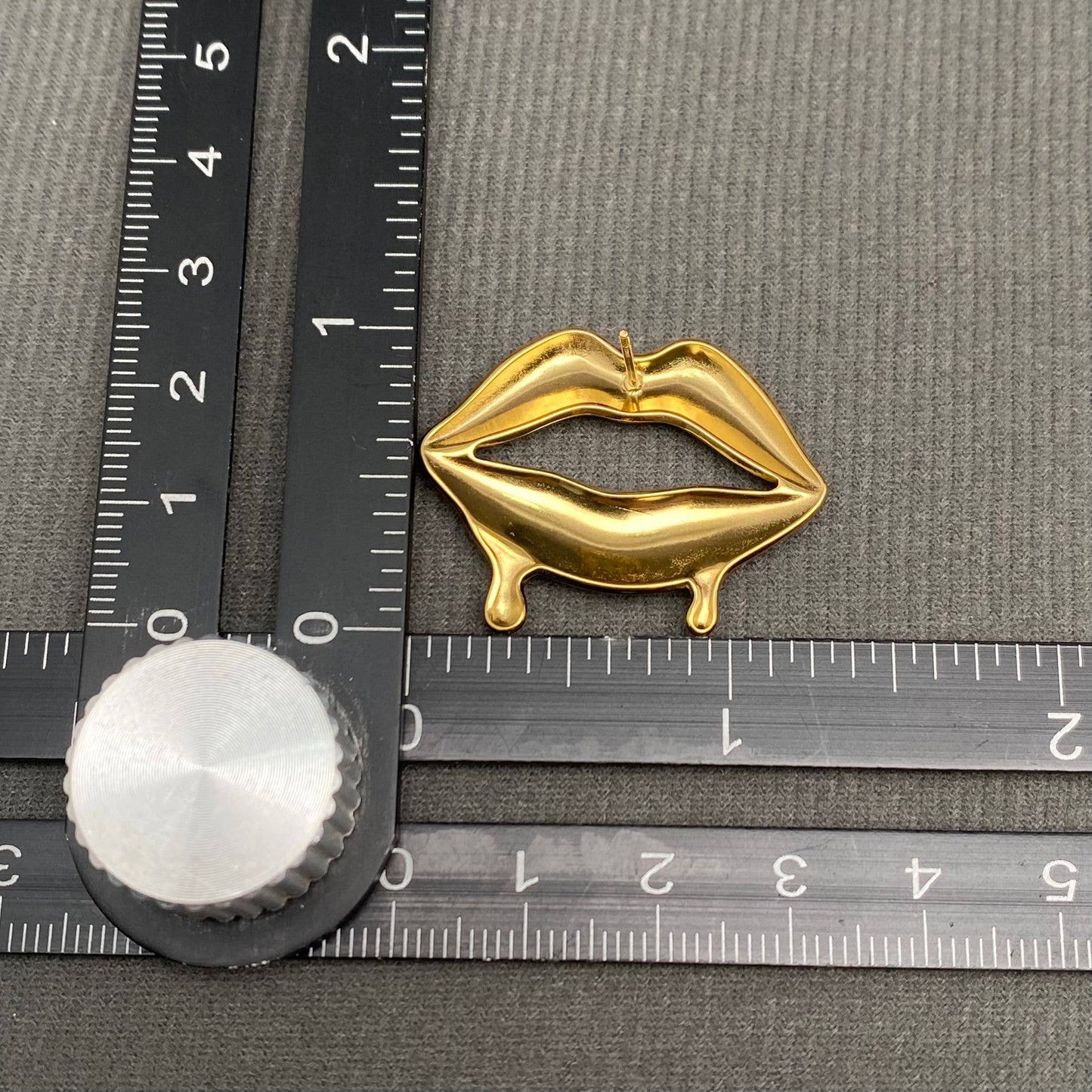 Glossy Lips earrings by Mio Queena featuring shiny, lip-shaped jewelry with a glossy finish for a bold, stylish look.