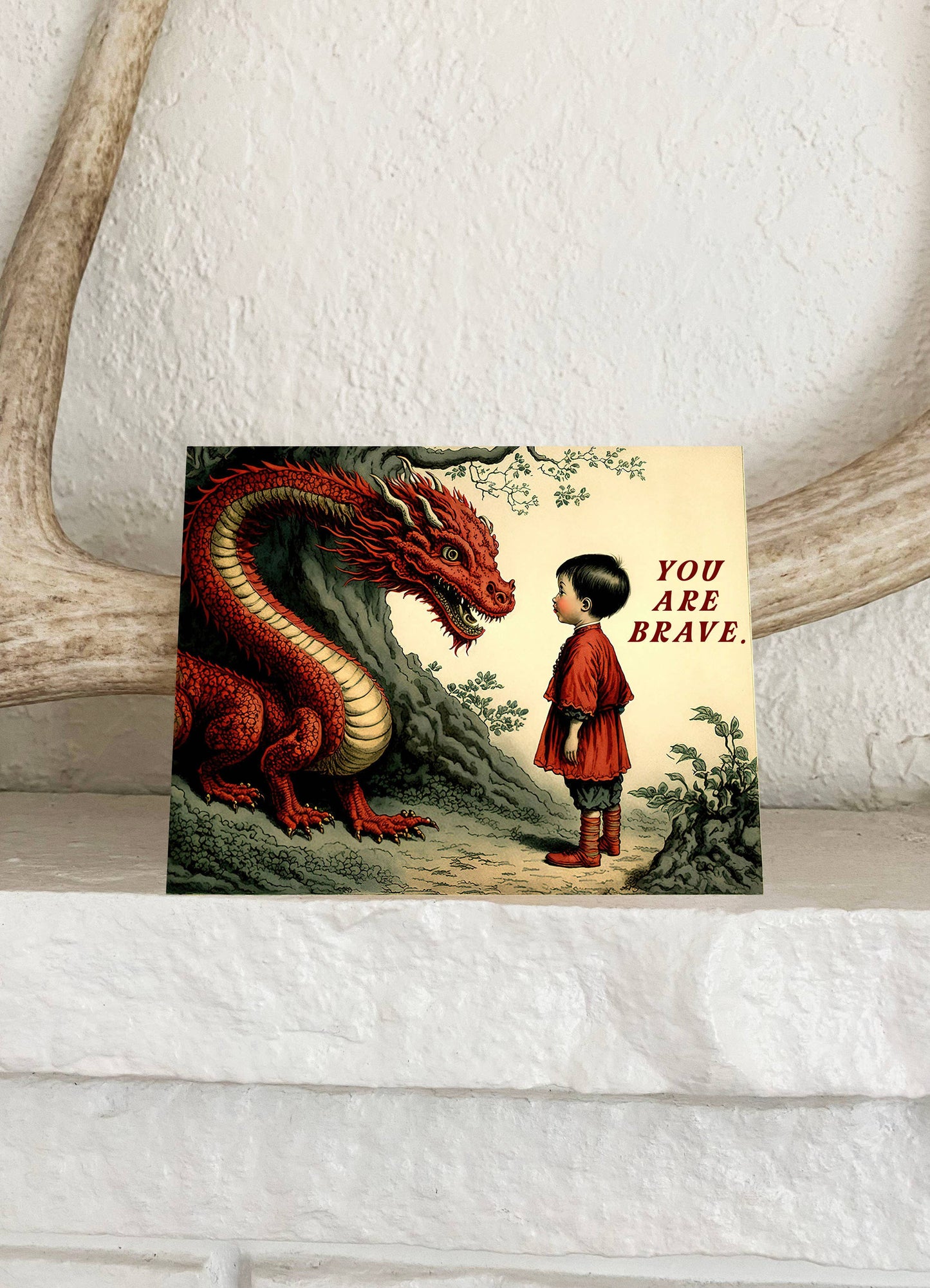 You Are Brave Dragon card by The Coin Laundry, featuring a colorful illustration of a brave dragon on a decorative card.