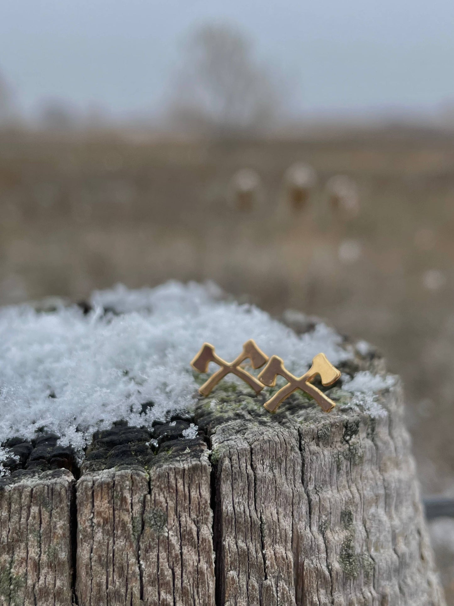 Made of Mountains Mini Forest Axe Stud Earrings featuring small, detailed axe designs on silver-tone studs.