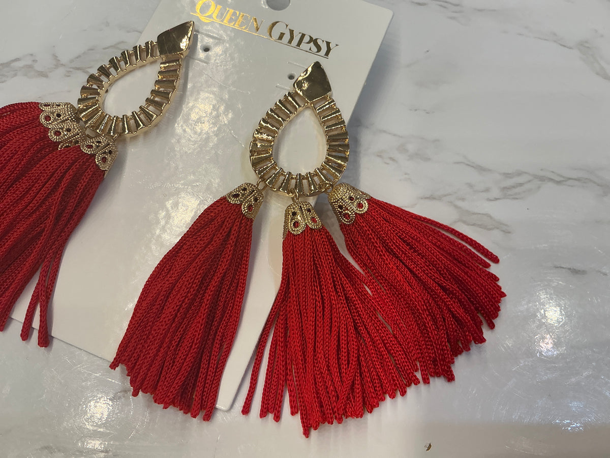 Gold tassel earrings from Queen Gypsy's Gypsy Queen collection with intricate detailing and dangling tassels.