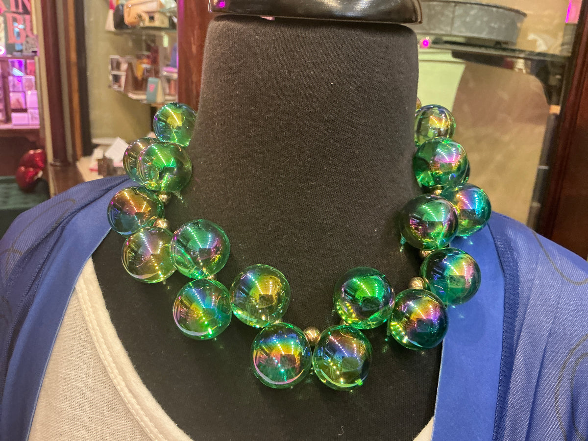 Queen Gypsy Bubble Statement Necklace featuring bold, colorful beads and large bubble-shaped designs on a silver chain.
