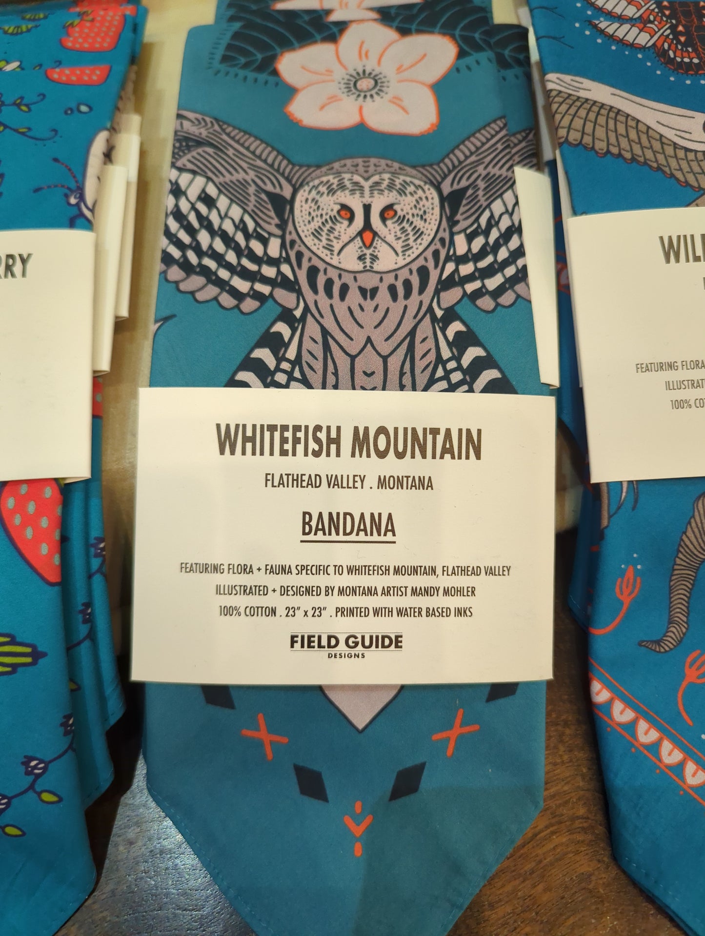 Whitefish Mountain bandana by Field Guide Designs featuring a white background and mountain-inspired pattern.