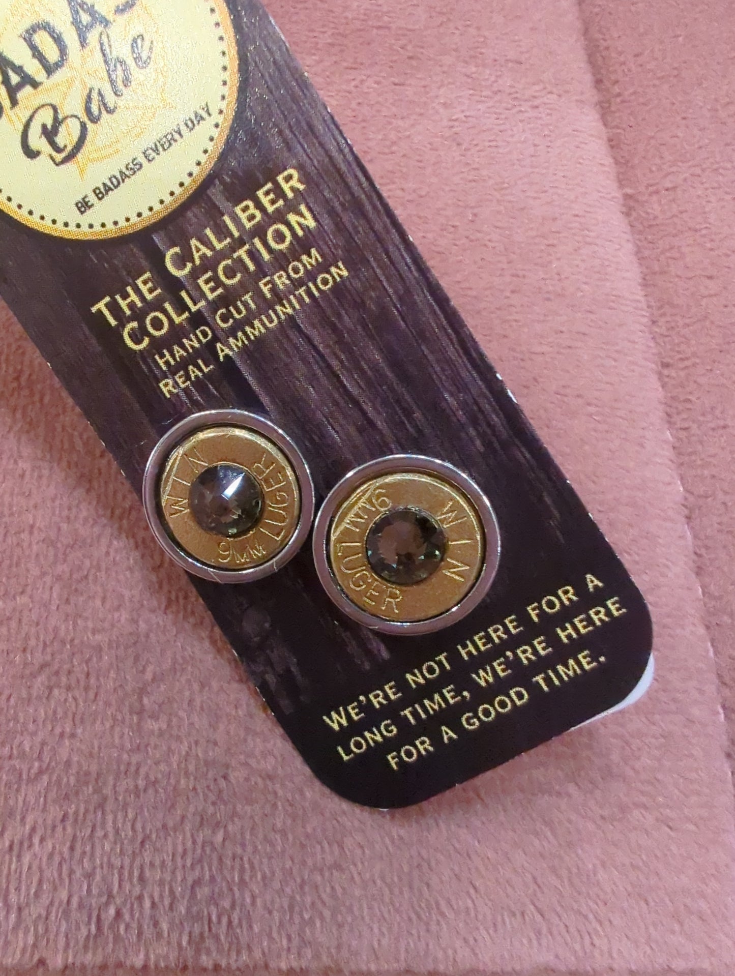 BadAssBabe Caliber Earrings featuring bold, silver-toned ammunition-inspired design, perfect for edgy fashion statements.