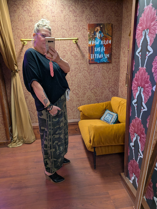 Oddi Camo Comfies bottoms featuring a green and brown camouflage pattern with a relaxed fit.