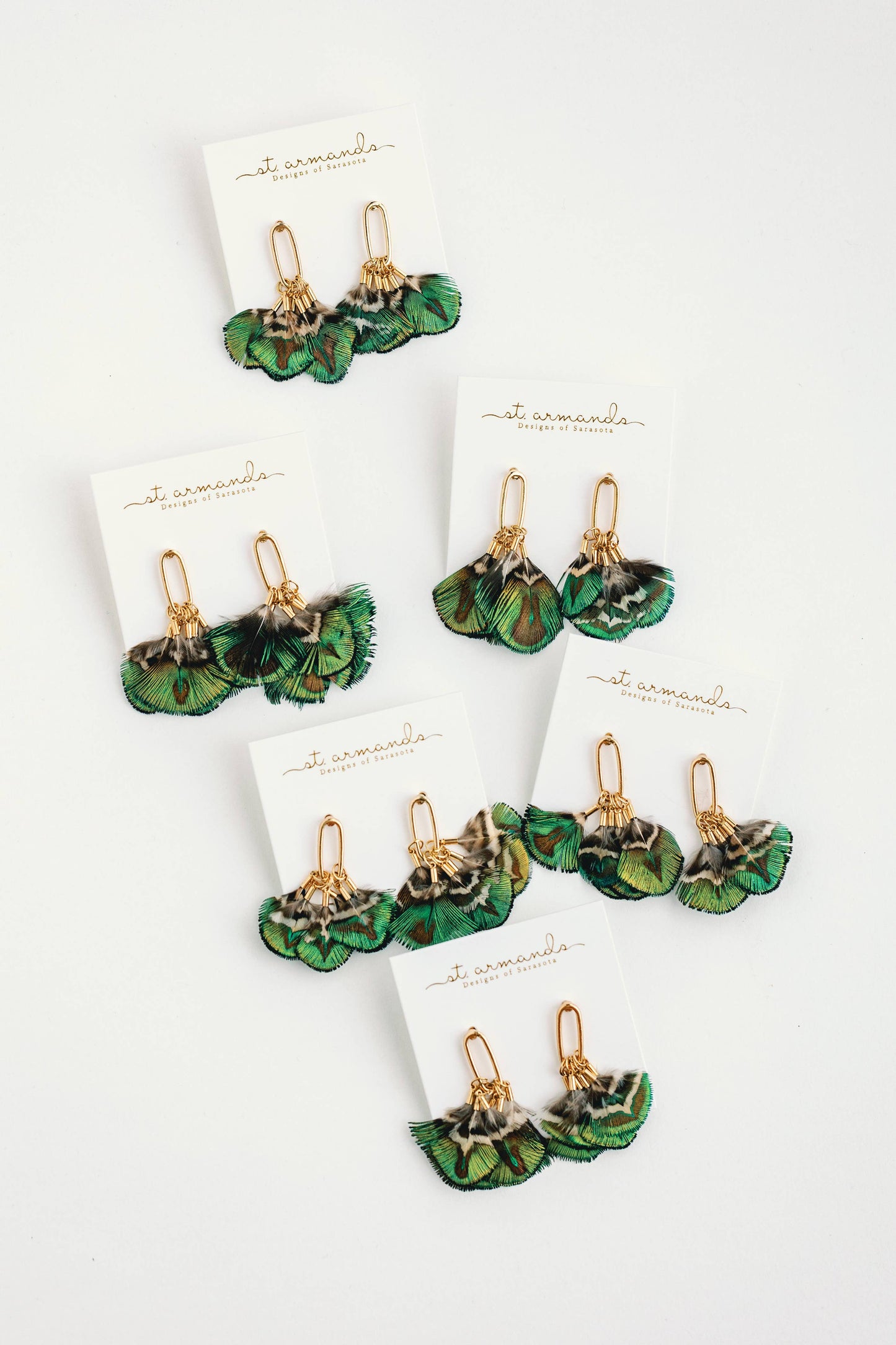 Mallard feather tassel earrings by St Armands Designs of Sarasota featuring elegant feather and tassel details for stylish wear