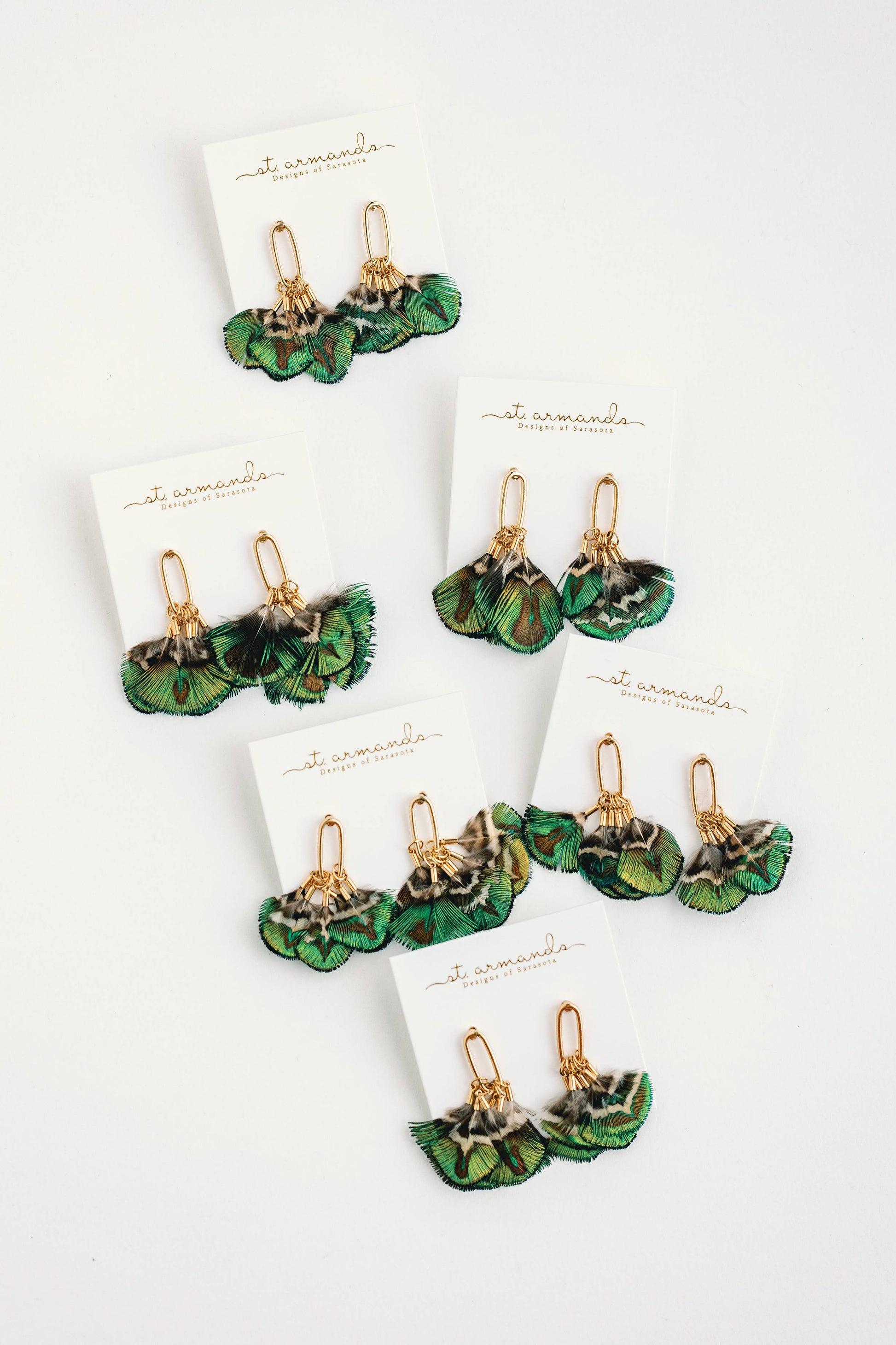 Mallard feather tassel earrings by St Armands Designs of Sarasota featuring elegant feather and tassel details for stylish wear