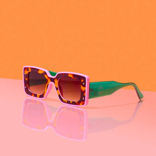 Tribe + Temple Deco sunglasses with round tinted lenses and bold black frames, stylish eyewear for sun protection.