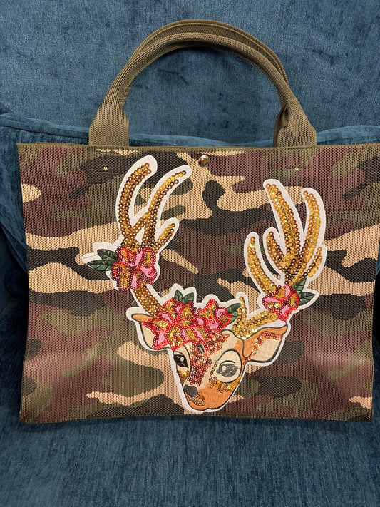 Queen Gypsy Buck on Camo Bag showing a stylish bag with a buck motif and camouflage pattern, perfect for casual or outdoor use.