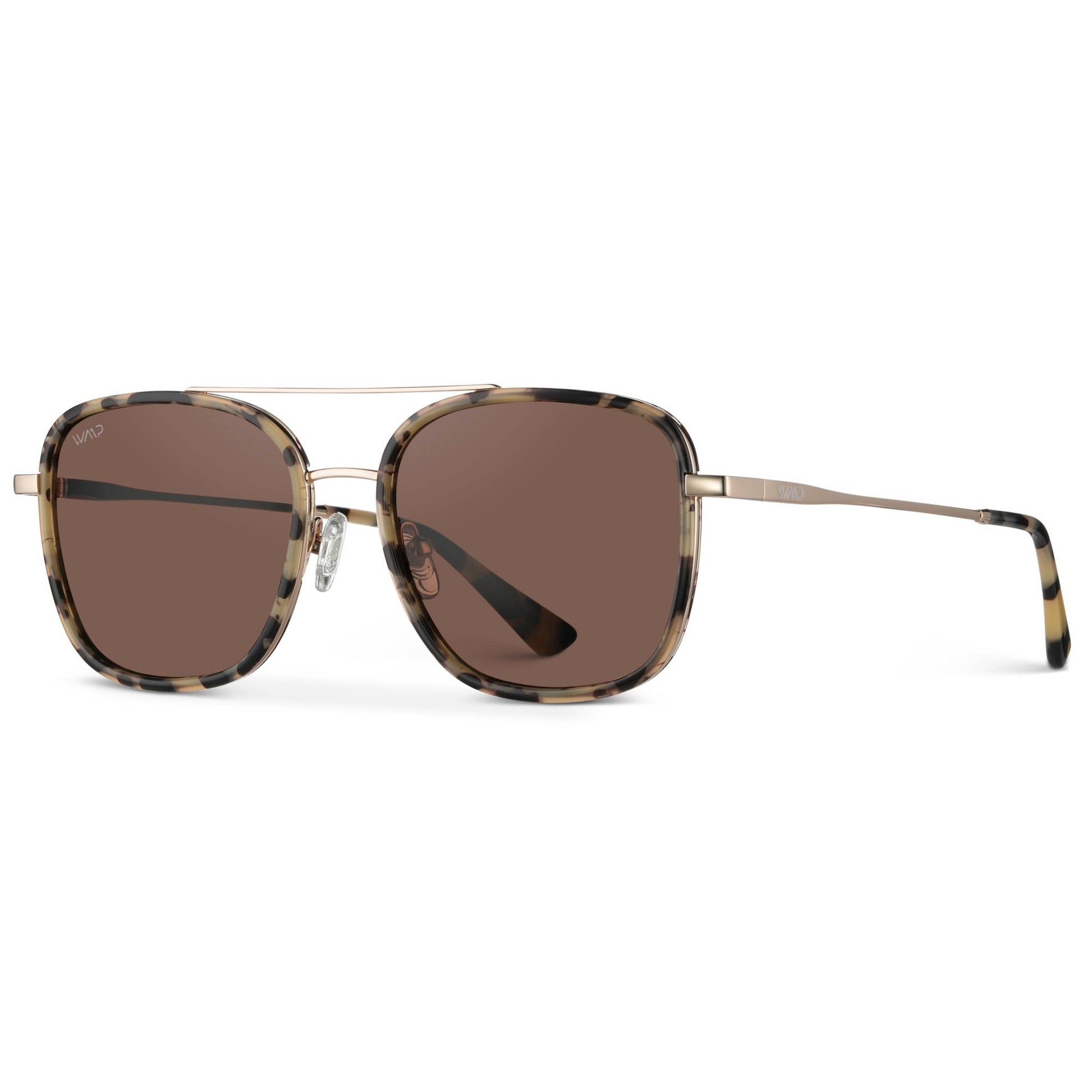 Gia women's sunglasses by WMP Eyewear featuring stylish frames and tinted lenses, shown on a model.