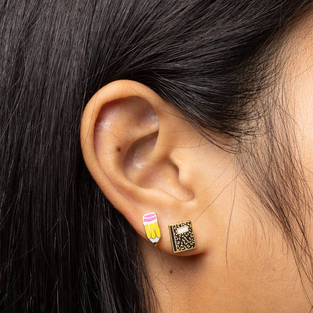 Gold Pencil and Composition Notebook earrings by Yellow Owl Workshop, teacher-themed stud earrings with detailed designs.