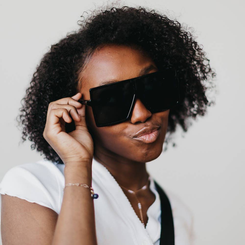 Pretty Simple Beverly oversized sunglasses with dark tinted lenses and thick black frames, stylish and trendy for sun protection.
