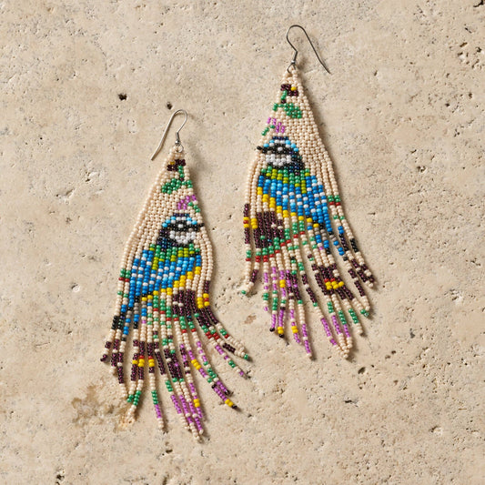 Beaded bird fringe earrings by Ten Thousand Villages featuring colorful beads and feather-like fringe design.