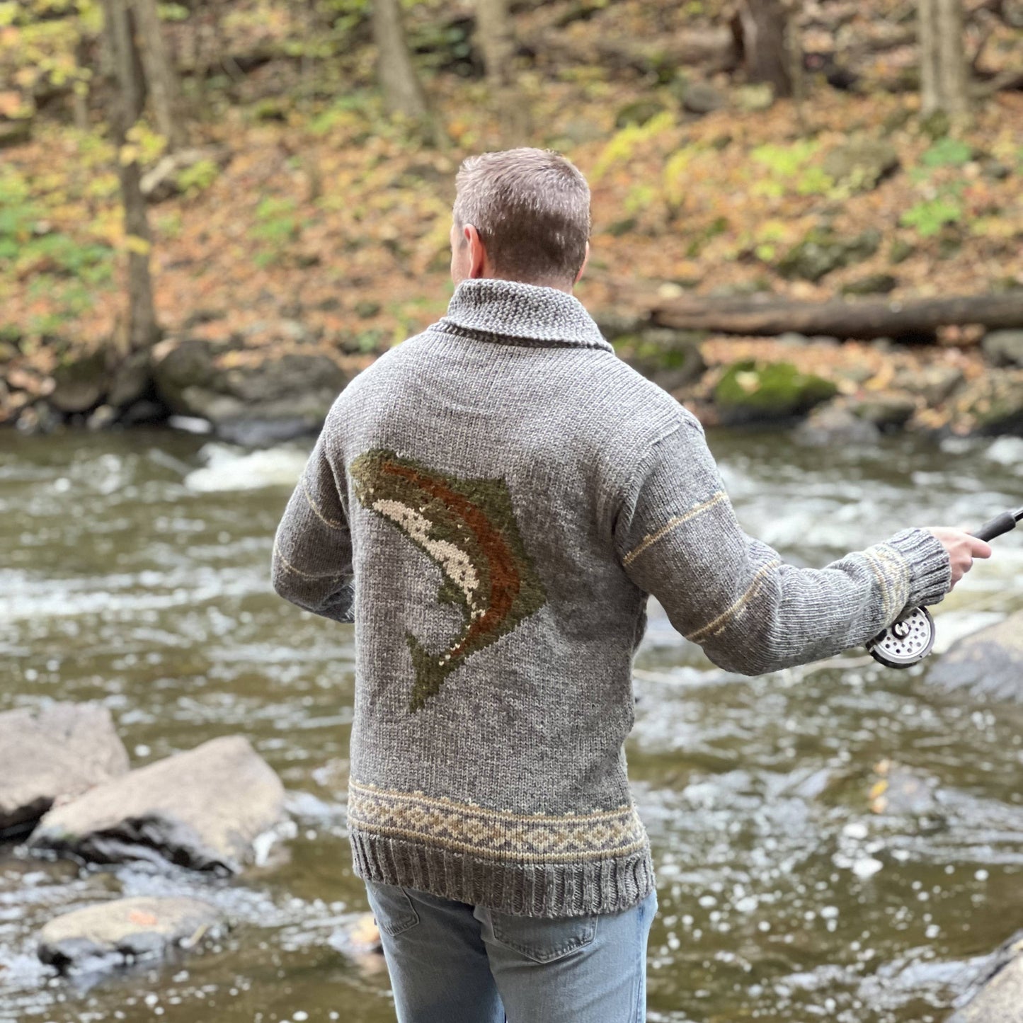 Lost Horizons Knitwear Gone Fishing sweater featuring a nautical fishing design, cozy knit fabric, and classic crew neckline.