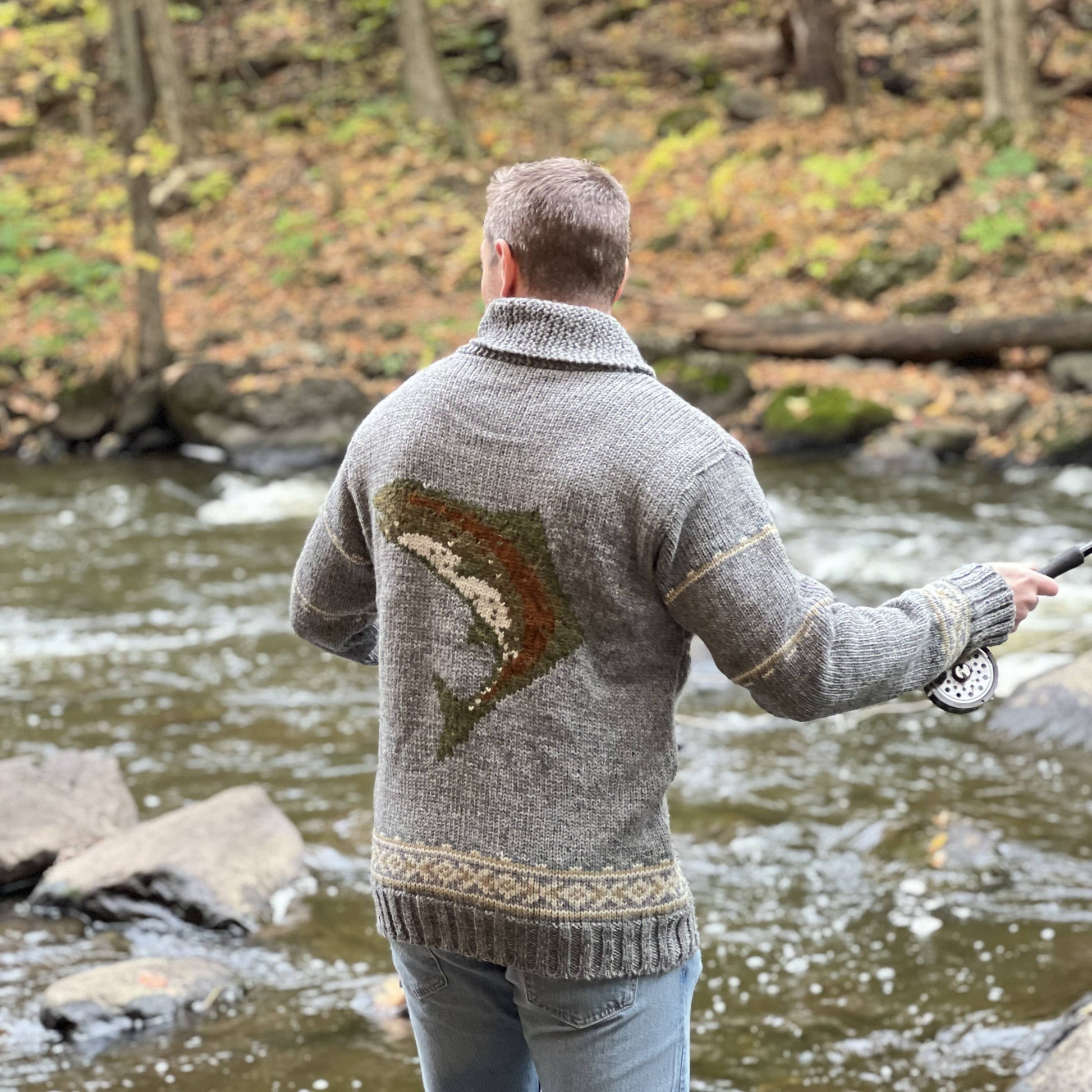Lost Horizons Knitwear Gone Fishing sweater featuring a nautical fishing design, cozy knit fabric, and classic crew neckline.