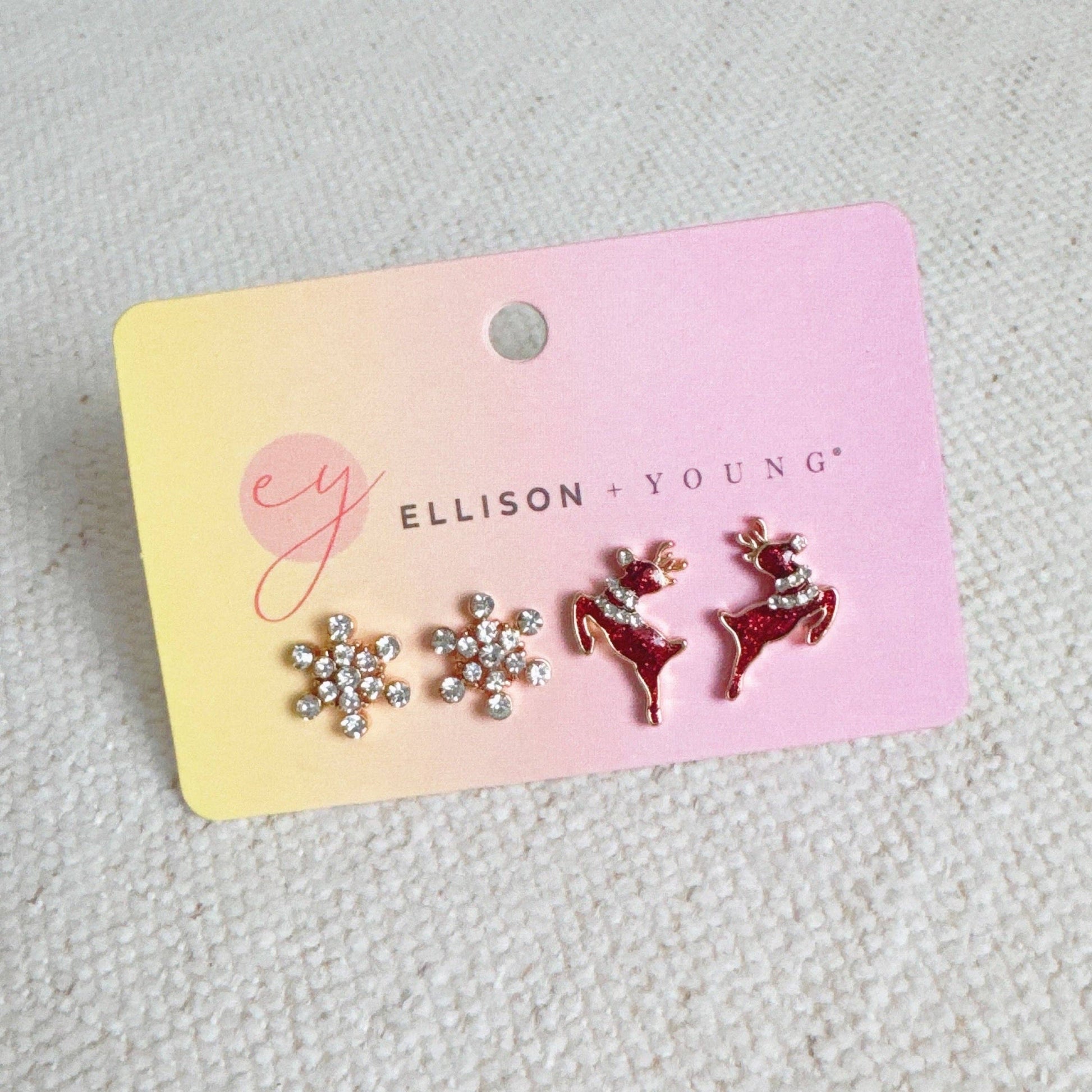 Ellison+Young snowflake stud earring with delicate silver design and small gemstone accents, perfect for elegant winter jewelry.