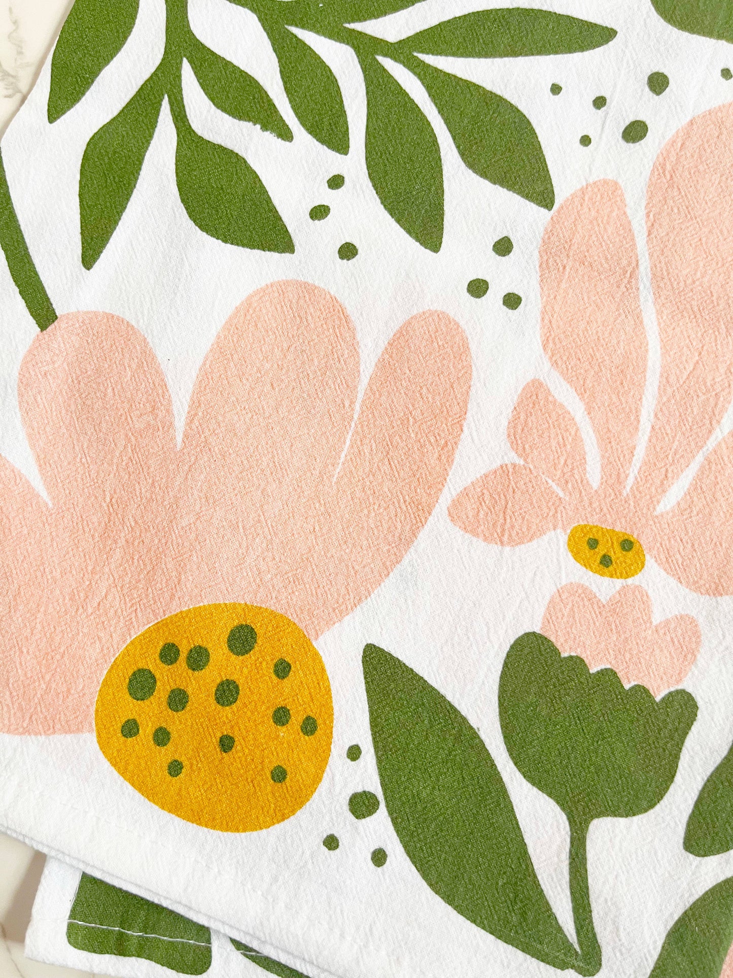 Tiger floral tea towel from The Coin Laundry featuring modern boho pink and green flower design, ideal for kitchen decor.