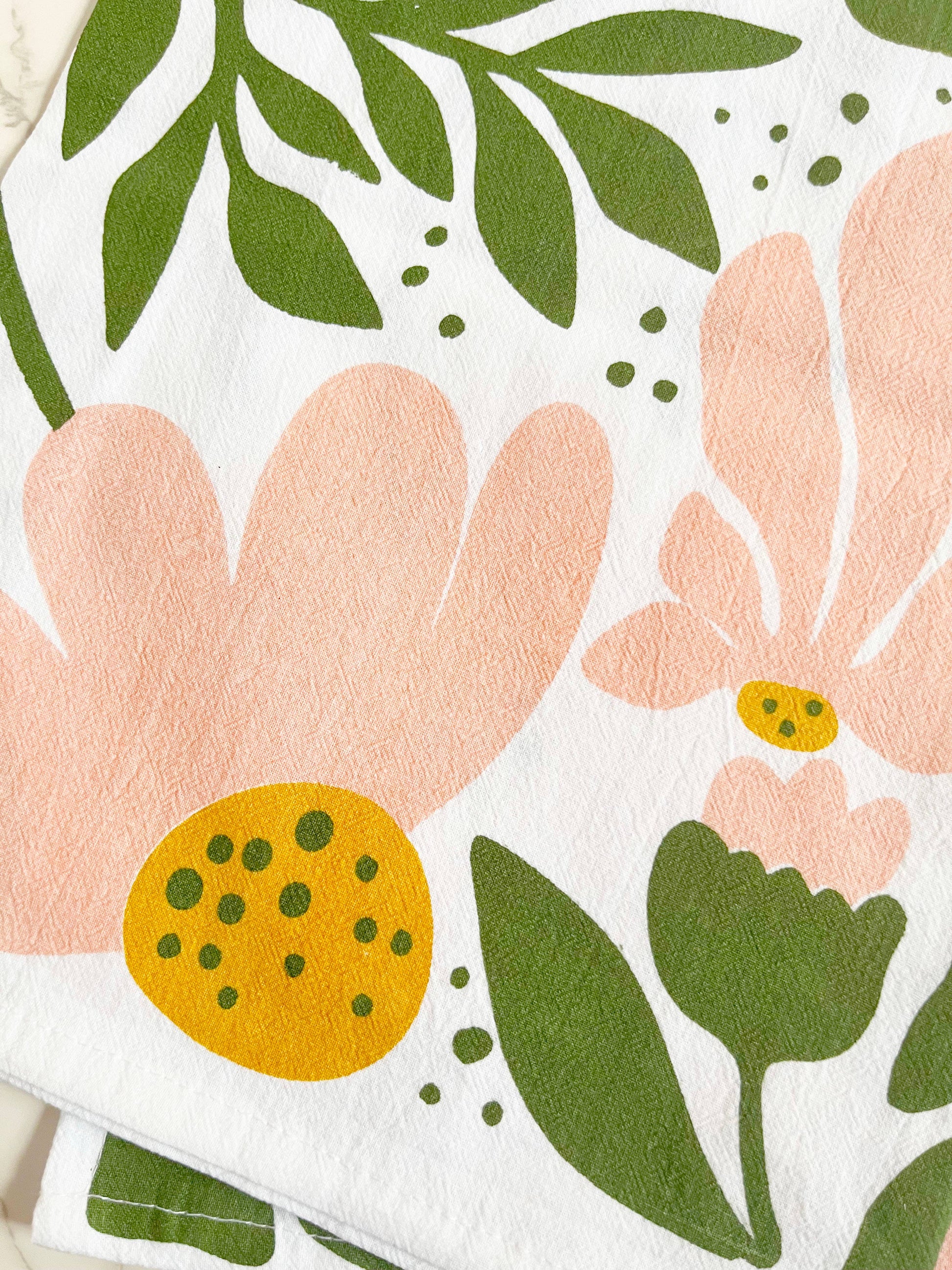 Tiger floral tea towel from The Coin Laundry featuring modern boho pink and green flower design, ideal for kitchen decor.