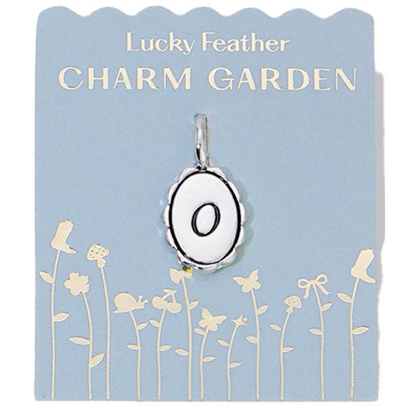 Silver scalloped initial charm with the letter O from Lucky Feather's Charm Garden collection, featuring intricate design details.