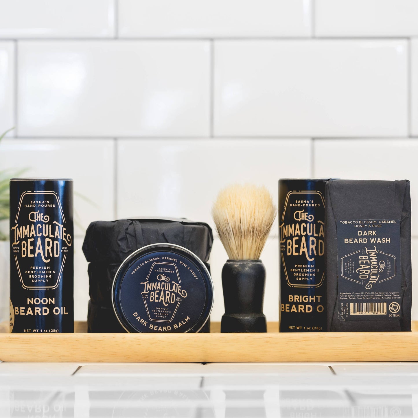 The Immaculate Beard shave soap puck with a smooth, rounded surface in a black container, ready for grooming.