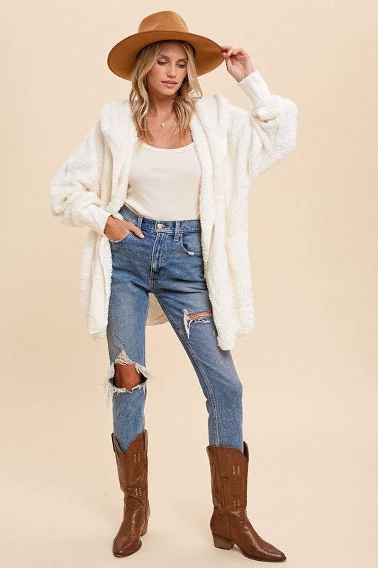 Women’s Teddy Bear Coat by A Sparkling Mess, cozy faux shearling outerwear with a plush, textured appearance.