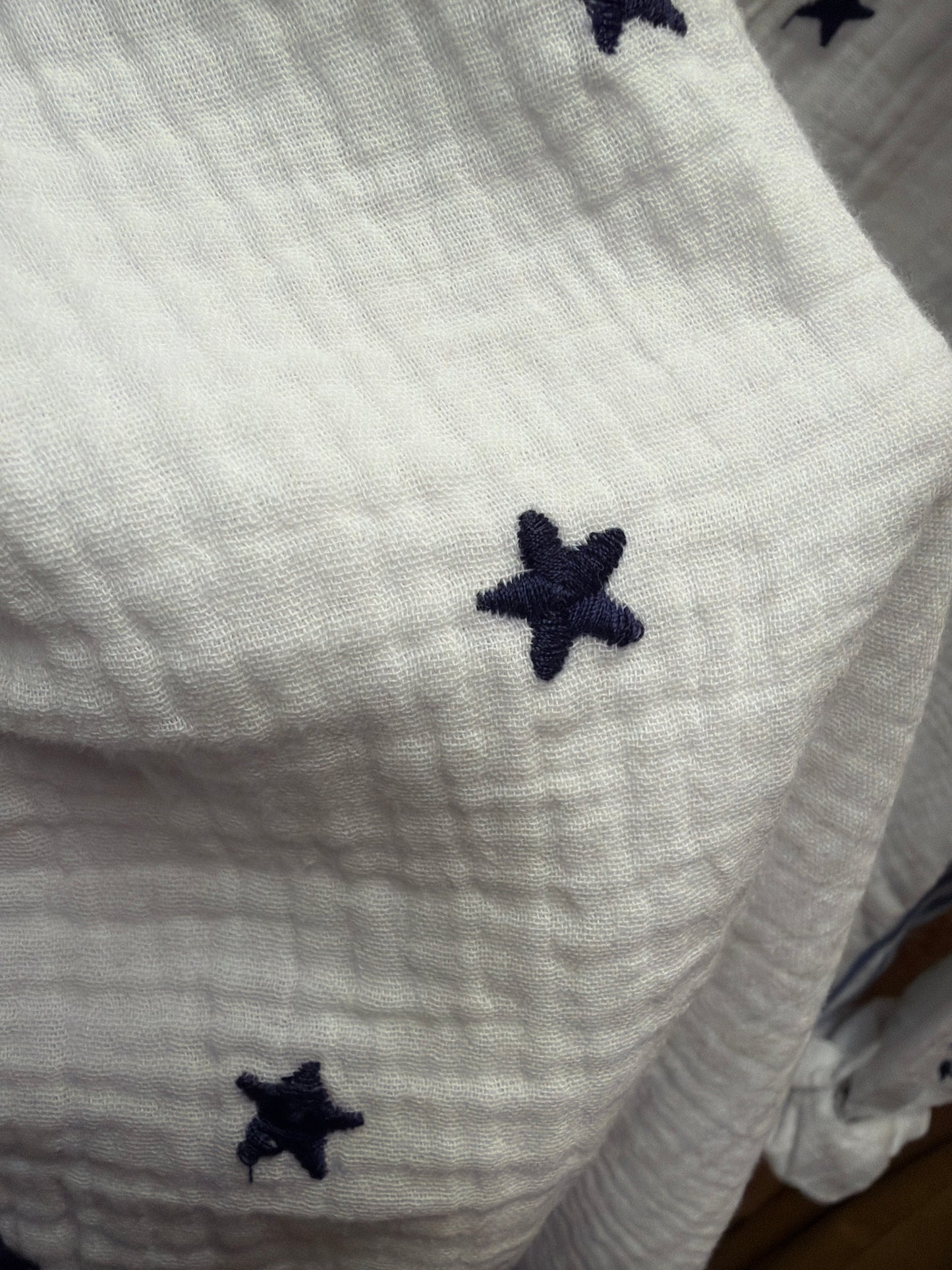 Camille & Co. Reach for the Stars blouse featuring a celestial star print, long sleeves, and a relaxed fit.