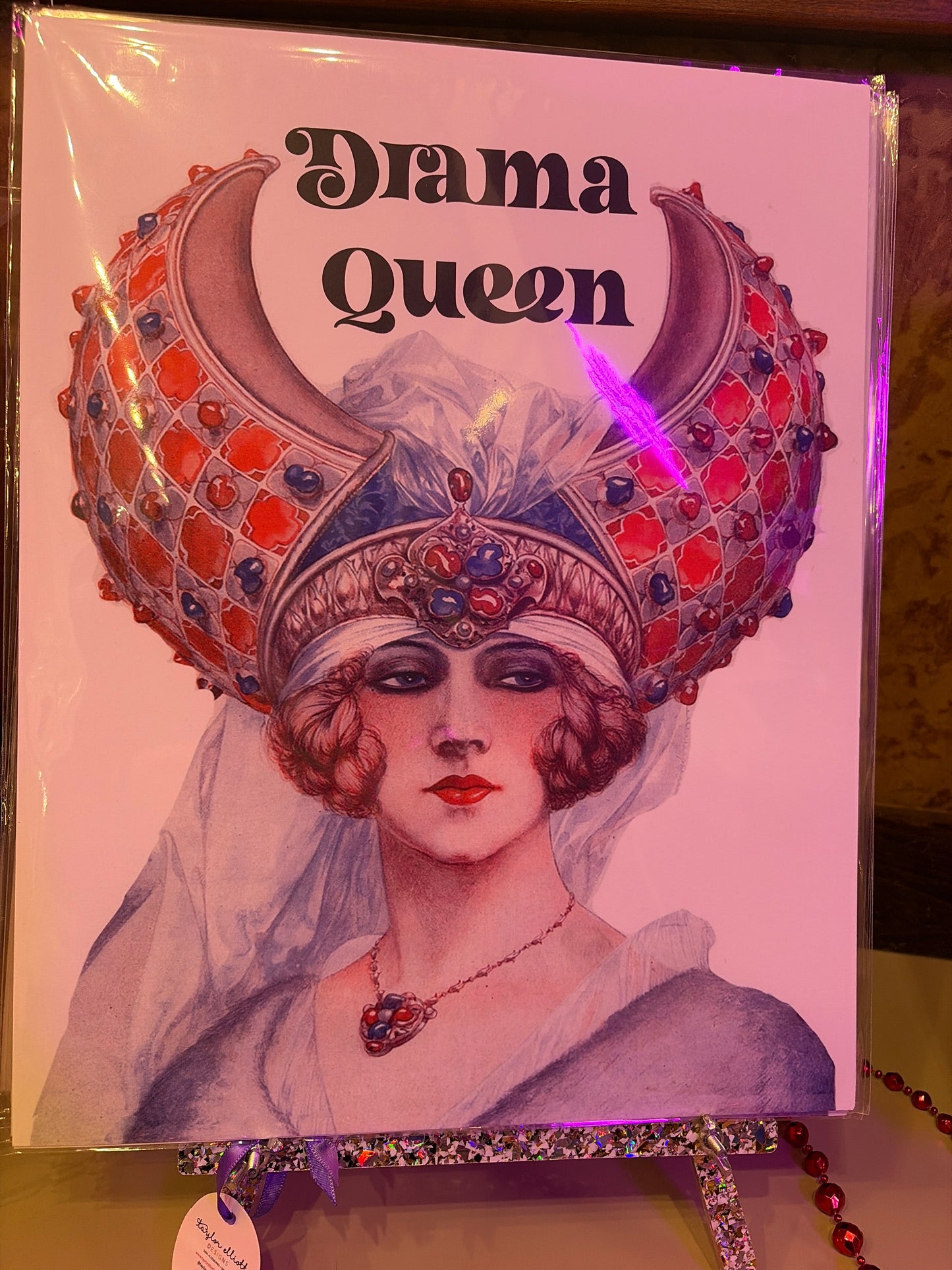 Drama Queen 11x14 print by The Twentieth featuring bold, vibrant artwork of a confident woman with dramatic makeup and accessories.