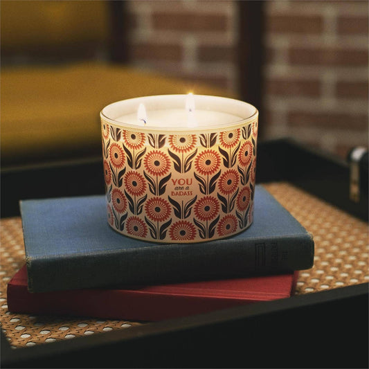 Questionables You Are Candle, a decorative scented candle in a glass jar with a minimalist design and warm glow.
