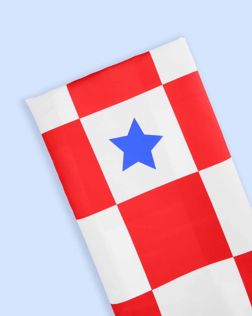 Set of washable Party In The USA themed napkins from xo, Fetti with patriotic red, white, and blue design on paper napkins.