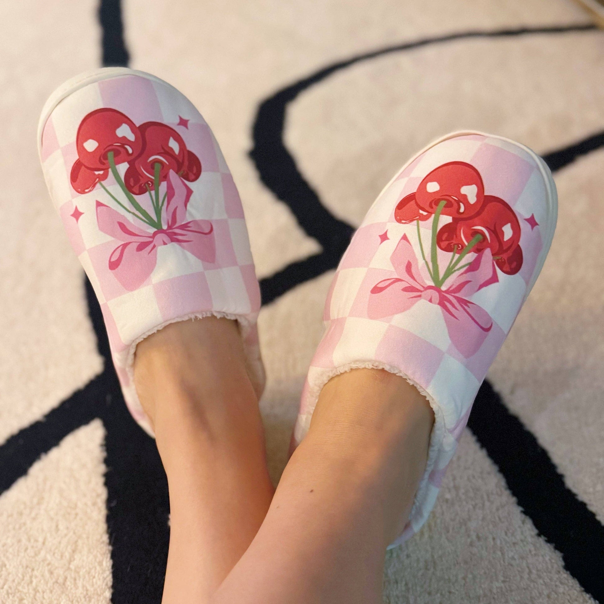 Ellison+Young Cherry Bow Check Lounge Slippers with cozy design and bow detail, perfect for relaxed indoor wear.