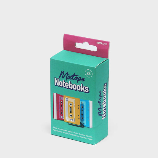 SUCK UK Ltd Mixtape Notebook with colorful cover featuring cassette tape design and lined pages for writing notes.