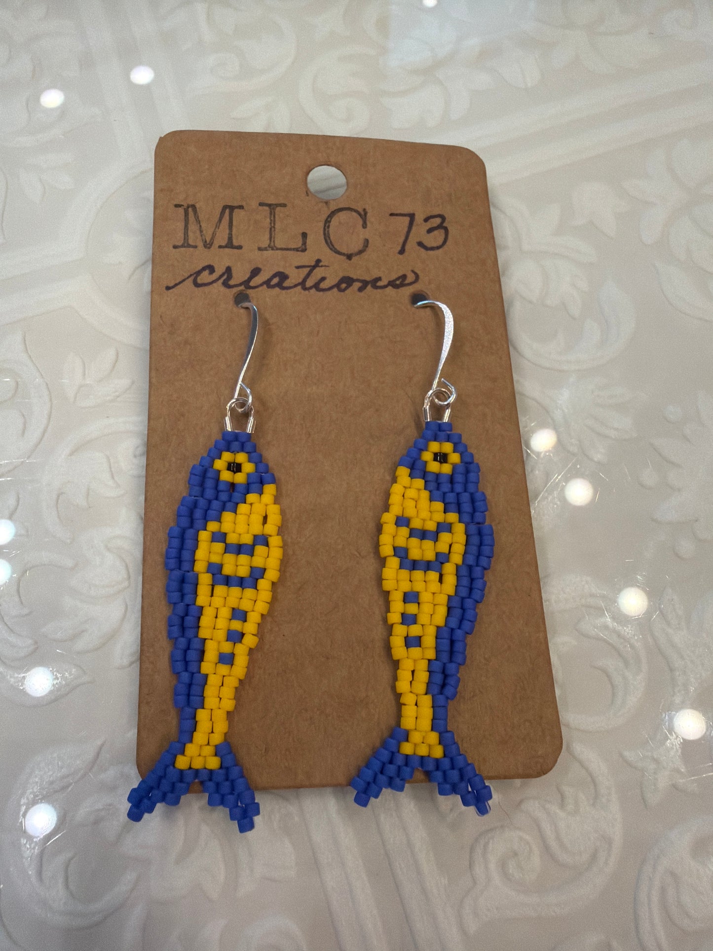Handbeaded Fish Earrings by MLC73 featuring colorful, intricate fish-shaped designs perfect for stylish jewelry accessories.