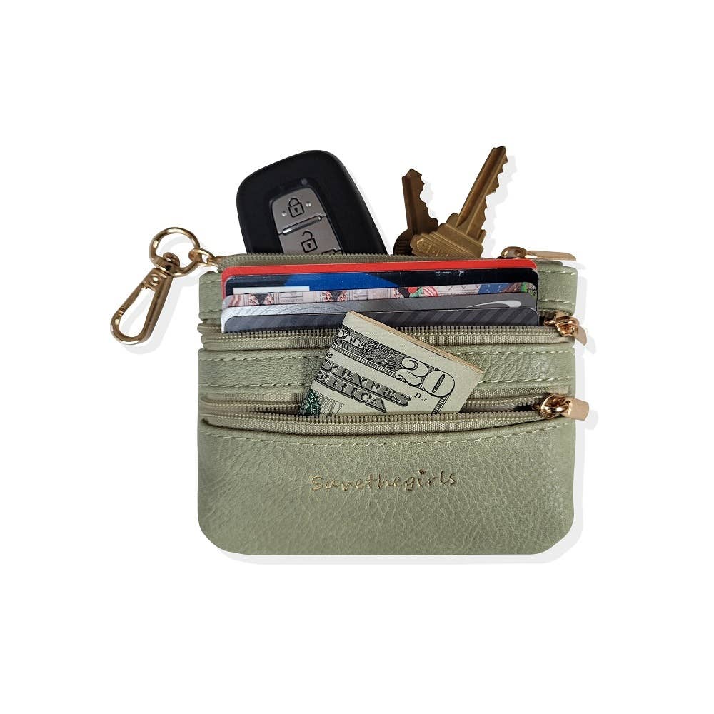 Save The Girls Clip & Go crossbody strap with zippered pouch for phones and accessories, shown in a neutral color.