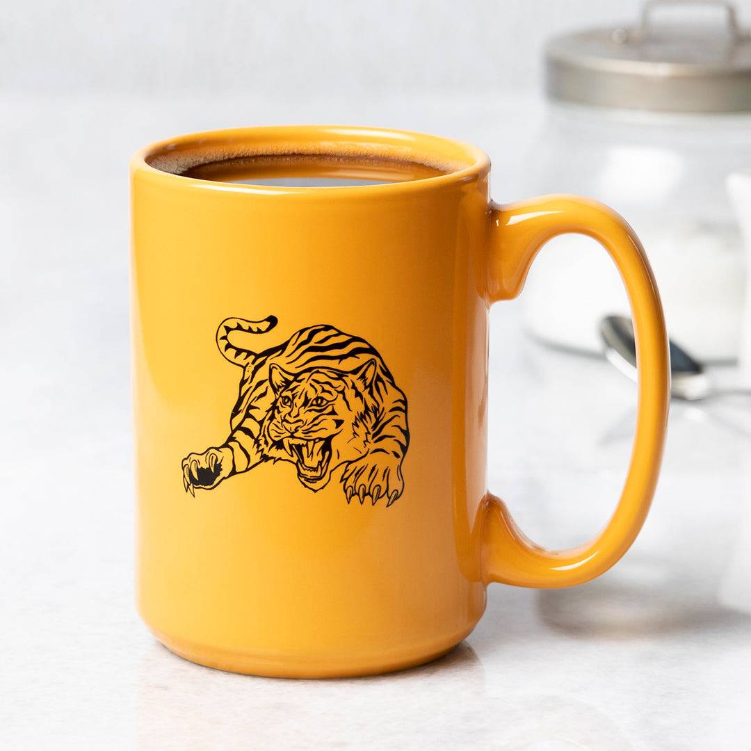 Counter Couture Tiger Mug featuring a vibrant tiger illustration on a ceramic mug, perfect for coffee or tea.