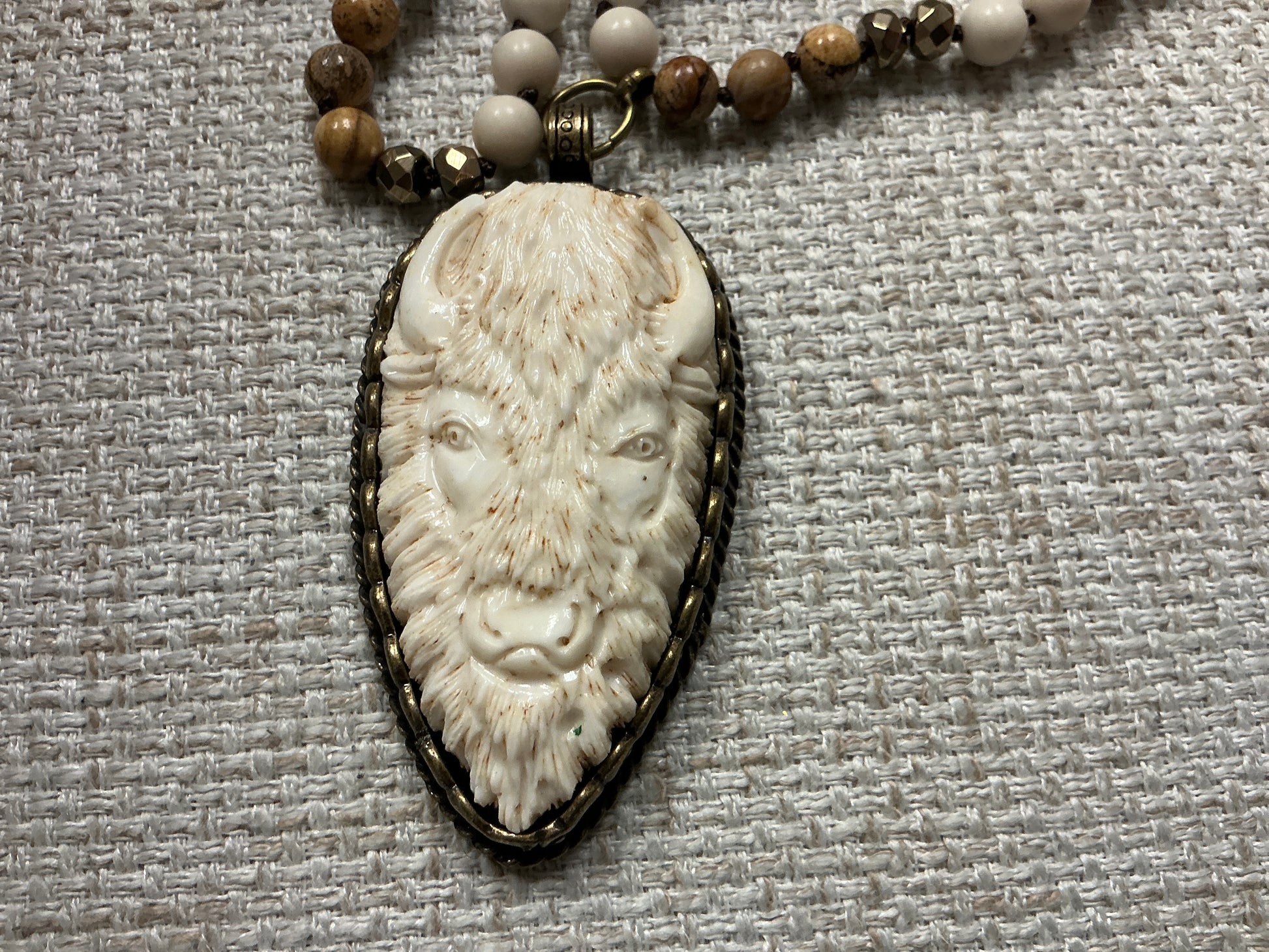 Beaded Buffalo Talisman Necklace with colorful beads and pendant, handcrafted jewelry by American Unique Group.