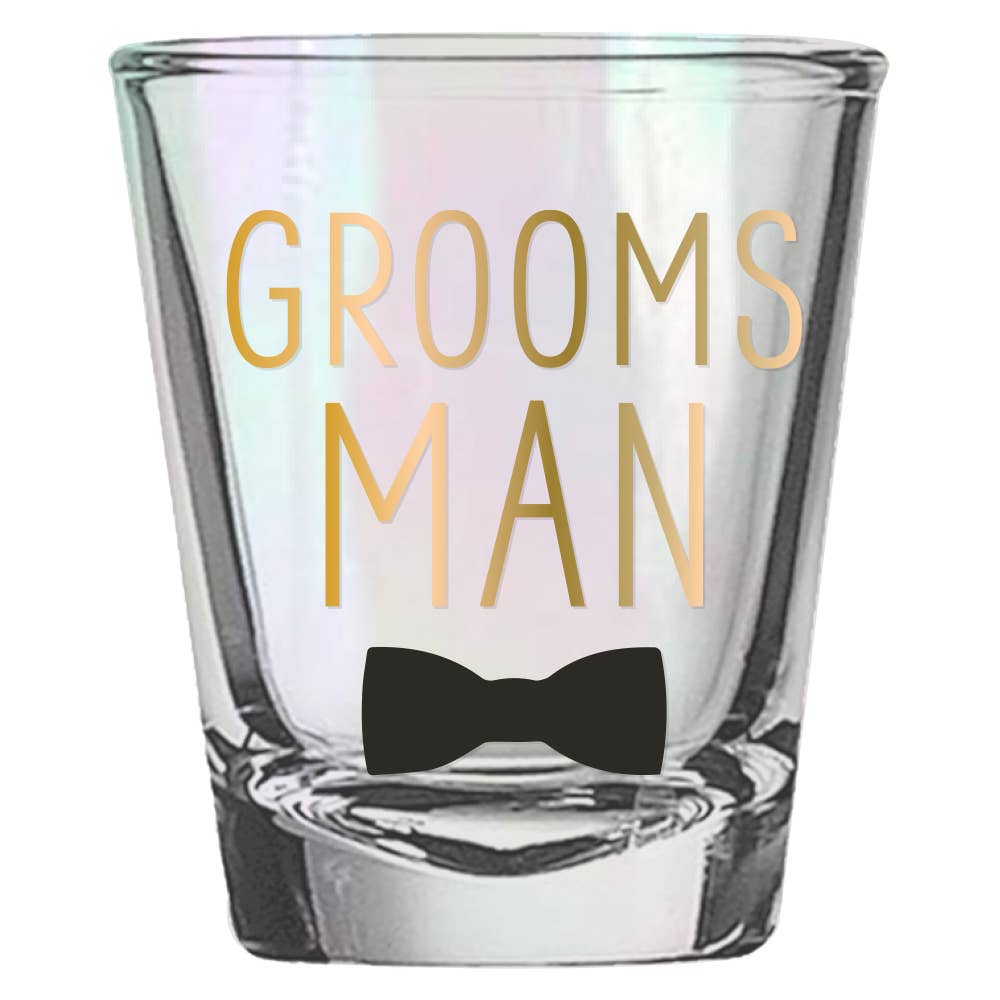 Pair of clear shot glasses with "Groomsman" engraved by Soiree Sisters, perfect for wedding toasts and celebrations.