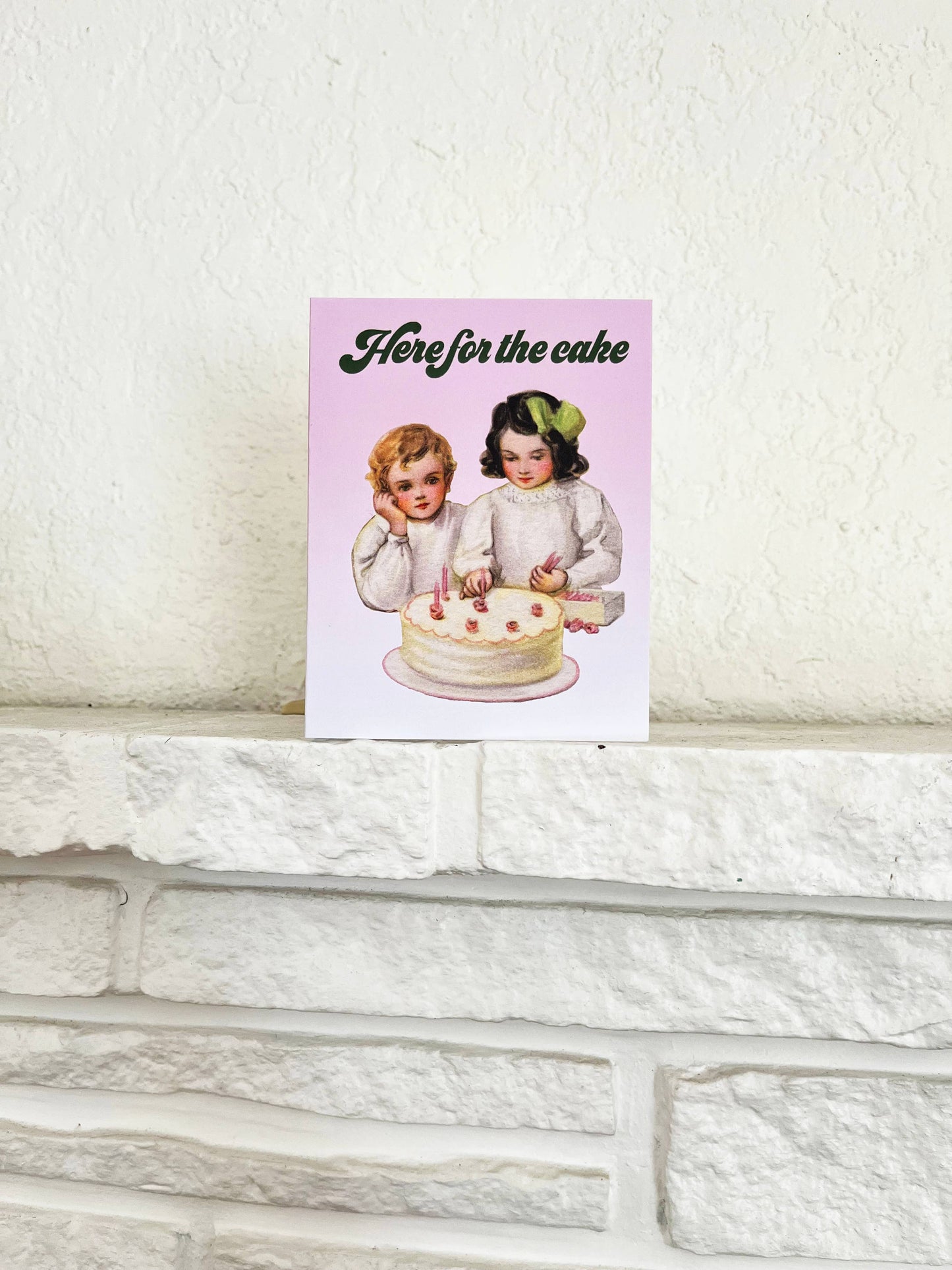 Funny birthday wedding celebration card by The Coin Laundry featuring humorous "Here for the Cake" design with colorful illustrations.