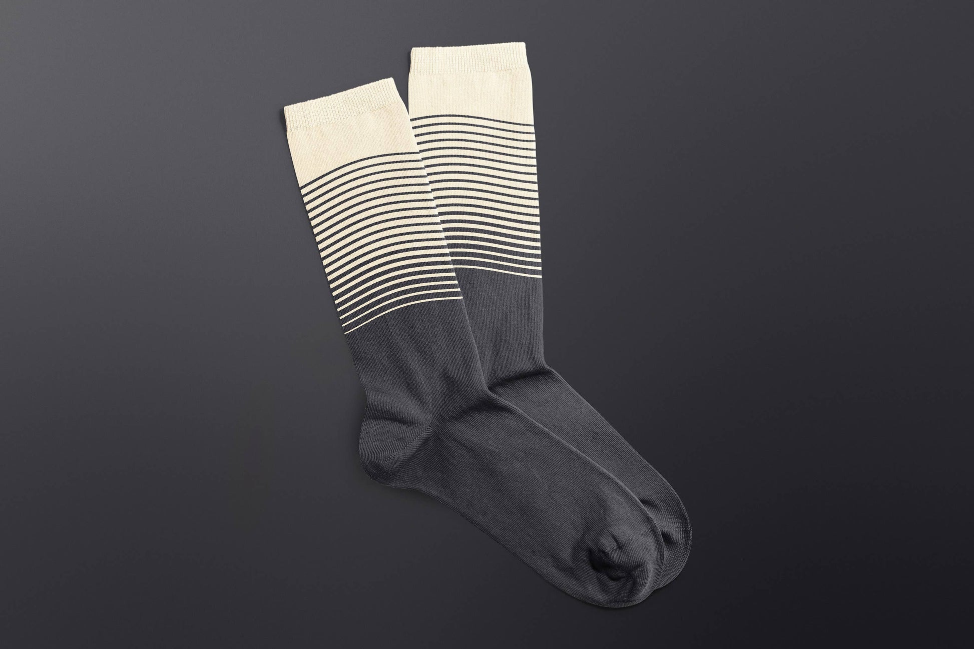 Pair of Craft Beer Socks by SUCK UK Ltd featuring colorful beer mug and bottle patterns on soft, comfortable fabric.