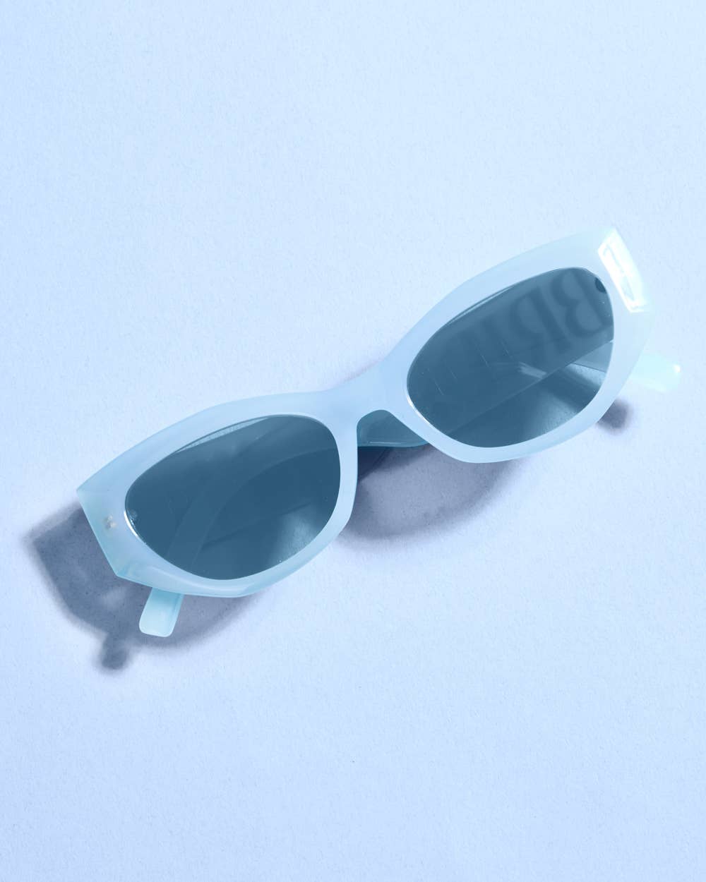 Bride embossed sunglasses from Something Blue Sunnies by xo, Fetti, featuring a stylish design perfect for bachelorette parties.