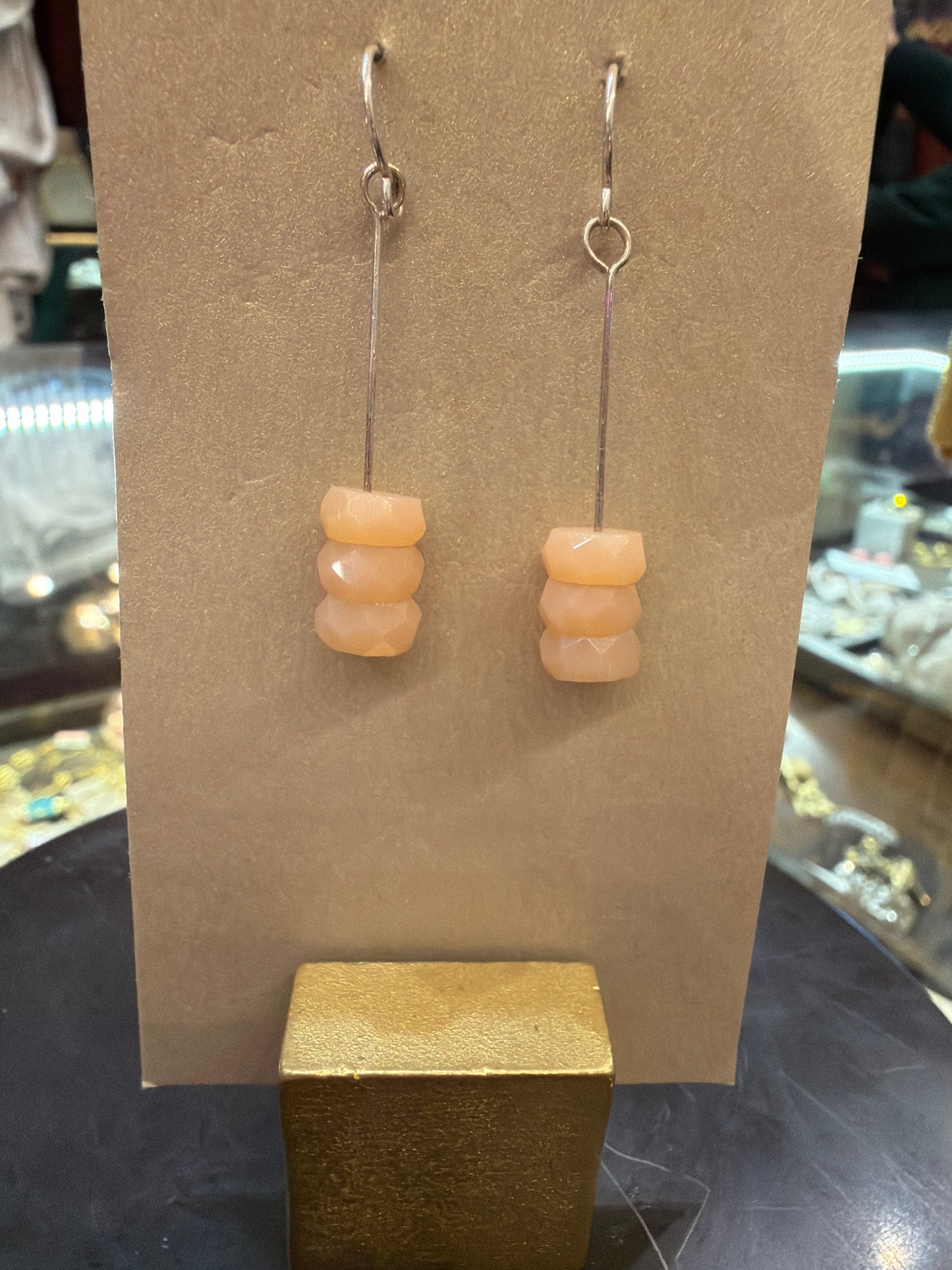 Goldust Jewelry GD semi-precious stone earrings featuring colorful gemstone beads and silver hooks.